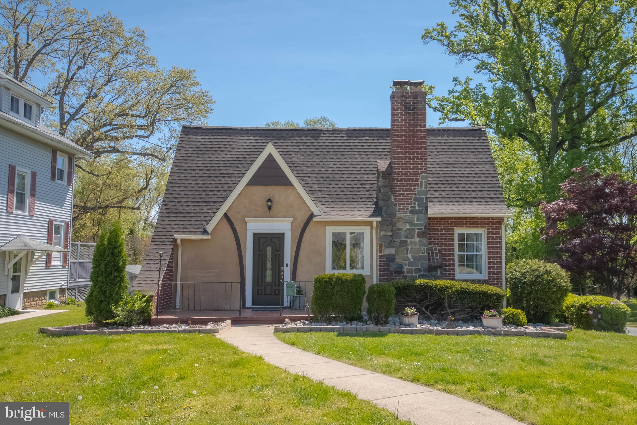 NOW Available in Aberdeen- Harford County.  Charming one-of-a-kind Cape Cod/Tudor-style home that has been renovated with many upgrades but maintains the charm of the past.  This home boasts 3 bedrooms and 2 full baths!  The second level had a major renovation in 2024 that adds approximately 687 sq. ft. of additional living space and includes an owner's suite with recessed lighting and LVP flooring, a luxurious full bath that includes a barn-style sliding door, double vanity with marble top, updated fixtures, walk-in shower with bench seating, rainfall and body jets.  Enjoy a large walk-in closet with unique hanging fixtures and barn-style sliding door. On the main level, you'll appreciate the original hardwood floors throughout the living and dining areas.  Neutrally painted throughout and updated lighting fixtures. 2 bedrooms and a full vintage bath on the main level. You'll love the updated kitchen with NEW LVP flooring, stainless steel appliances (updated 2023-2025), quartz countertops and a spacious pantry area that you can configure to your liking.  You'll enjoy plenty of extra storage in the lower level including an attached 1-car garage and updated washer/dryer (2023).  If the interior isn't enough, then let's step outside to your outdoor selling features.  You'll be able to relax on your screened-in deck or your 12 x 16 stamped concrete patio that overlooks a huge backyard.  Partially fenced with firepit, pond and 2 sheds (sold as-is).  You'll also enjoy two patios on the front and side that overlooks a double lot that has a combined 0.82 acres!  Extensive landscaping including river rock. Updated architectural shingle roof and stucco front refinished recently.  You'll appreciate the charm and updates of this beautiful home!  Schedule YOUR appointment TODAY!