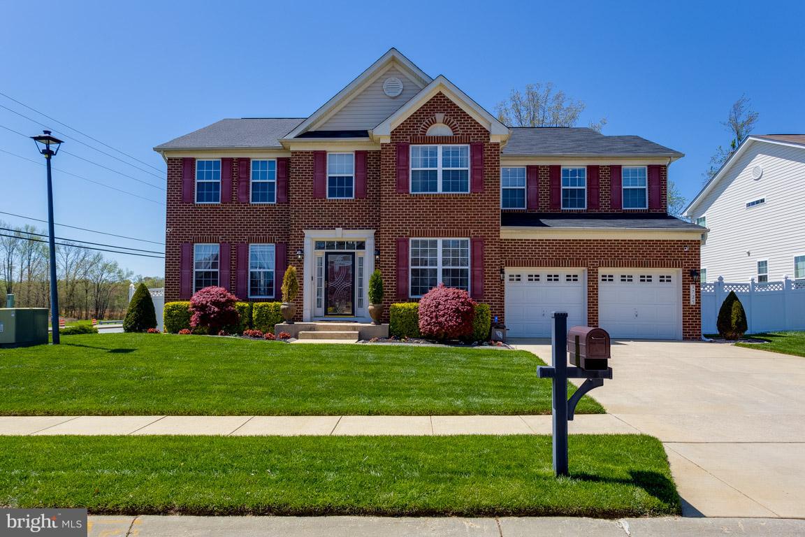 Gorgeous Colonial! This 4 bedroom beauty boasts a gourmet kitchen with granite counter tops, a delightful sun room, open floor plan and a beautiful, large master bedroom with a designer study/office. Check out the upgrades master bathroom! Fully finished basement with an extra bonus/bedroom and a theater room for the entire family to enjoy! Deck, fence and the yard comes with a sprinkler system!
