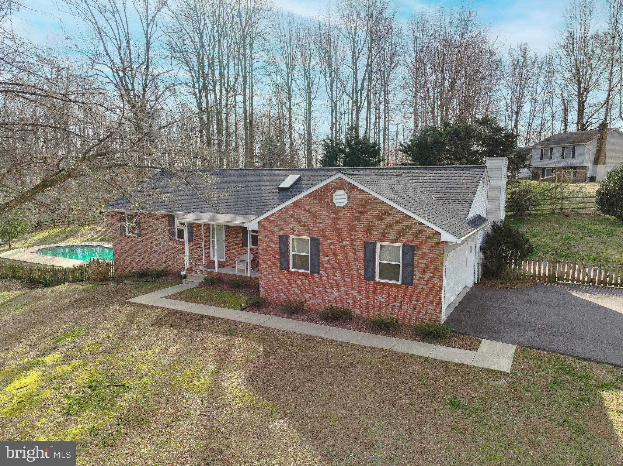 Welcome to your dream home in the heart of the highly sought-after Owings Farm subdivision! This captivating rambler, nestled on a generous 1.35-acre lot, is debuting in the real estate market. Sold by the original owners, this home has been lovingly lived in and cared for since 1985, promising to be a true showstopper.

Upon entering this meticulously maintained residence, you'll immediately notice a series of upgrades completed within the last 5 years, showcasing a commitment to modern living. The comprehensive list, conveniently available online, includes a new septic system (2020), a well pump, roof, gutters, windows, a gas fireplace, and a pool heater. Every detail of this home has been thoughtfully considered.

The main level emanates warmth, featuring a galley kitchen seamlessly connected to the fireplace room, creating an inviting space for both relaxation and dining. Access the deck from this level to enjoy the seamless transition to outdoor living. The home also offers a charming living space, a dining area, two secondary rooms, and a full bath. The primary bedroom, with breathtaking views and an ensuite bathroom, completes the main-level experience.

Descending to the basement, you'll discover a wealth of entertainment possibilities. Easy access to the pool and patio ensures a smooth flow for gatherings. The basement boasts a full bar, a den, two bonus rooms, a spacious laundry room, and a wood-burning fireplace—perfect for creating cozy evenings with loved ones.

Step outside into the professionally landscaped backyard, a tranquil retreat that enhances the overall appeal of this property. Immerse yourself in the beauty of nature and relish the private oasis that awaits.

This home offers location, privacy, and top-notch schools, setting it apart. Situated in one of the most desirable locations in the DC Metro area, you'll effortlessly avoid traffic en route to DC, reach the picturesque twin beaches of North Beach and Chesapeake Beach within a mile, or quickly head to Annapolis via Rt 2. Embrace the convenience of exceptional schools, and all that Calvert County has to offer.

Seize the opportunity to make this enchanting property your own, where functionality meets prime location. Your dream home awaits in Owings Farm! Take advantage of the chance to call this place home.