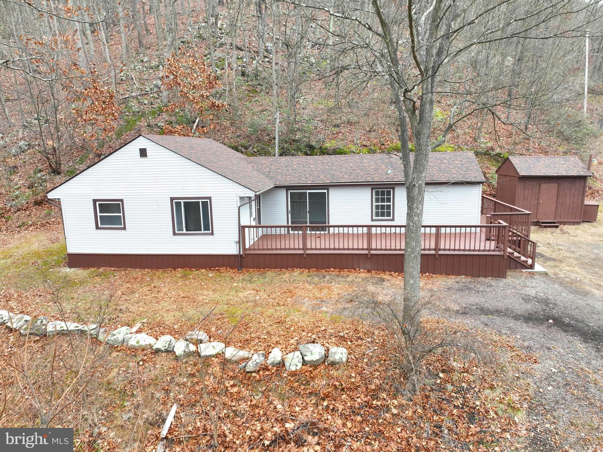 Your Dream Weekend Getaway Awaits – Just 2 Hours from D.C. Escape the hustle of the Washington, D.C. Metro area and Northern Virginia suburbs to discover your slice of freedom atop Romney Mountain in the heart of Hampshire County, West Virginia. This fully renovated cabin sits on a sprawling 29.25-acre parcel, offering breathtaking views and endless opportunities for hunting, outdoor recreation, or simply reconnecting with nature. Featuring 2 cozy bedrooms and a full bathroom, the cabin has been meticulously updated with a new roof, modern HVAC system, and stylish renovations throughout—creating the perfect blend of rustic charm and contemporary comfort. Adventure is just beyond your doorstep! The property is only minutes from the South Branch of the Potomac River and within close proximity to thousands of acres of public land, providing limitless opportunities for hiking, fishing, kayaking, and outdoor exploration. Whether you’re seeking a peaceful weekend hideaway or a basecamp for your next adventure, this mountain retreat offers the serenity, freedom, and convenience you’ve been searching for—all within an easy, scenic 2-hour drive from the city. Make this your weekend escape and start creating lasting memories in the heart of West Virginia’s natural beauty!