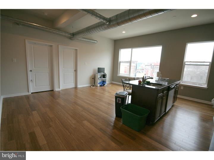 Available Now: Unit #9 is a 3BD/2BA unit located on the 3rd floor of a multi-unit building with modern updates throughout, including hardwood floors, spiral ductwork, mosaic tile backsplash, high ceilings and a front-loading washer/dryer in unit for ultra convenience. The open floor plan living and kitchen area are perfect for entertaining and the kitchen island provides additional seating or prep space. The room is large enough to allow for a variety of different setups and to have a dining space as well. First full bathroom is off of this main living space and the second full bathroom is attached to one of the bedrooms.   Kitchen has granite countertops, stainless steel appliances (gas range stove, microwave, refrigerator, dishwasher and garbage disposal) lots of cabinet space plus an additional pantry closet for extra storage. All three bedrooms are about equally sized, although one has the en-suite bathroom.  1509-11 W Girard Ave is a newly constructed building which is professionally managed by JG Real Estate, has resident-only parking available, an elevator and well-kept & cleaned common areas. You will be able to pay your rent/submit maintenance requests directly online, have a 24/7 emergency maintenance hotline, and receive professional and courteous service from the property management staff. There is garage parking available directly underneath the building for $50/month.  Located just off of Broad & Girard, this building is extremely convenient to public transportation as you can walk a half block to the Broad Street Subway Line or to multiple trolley stops on Girard Ave. Close to Temple University, Fairmount/Art Museum areas.  First month, last month, one month security deposit due at lease signing. $65 move-in fee. $45 application fee per applicant. Pets are conditional on owner's approval and will require additional deposit, if accepted. Tenants responsible for electricity, gas, cable/Internet. Water is included in the rent.