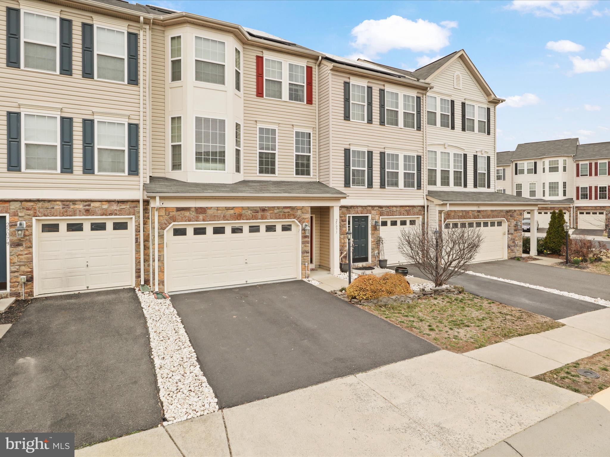 **For Rent**This solar powered 3,092 square foot, 3 bedroom, 3 full bath, and 1 half bath townhome is located in the highly sought-after Stone Ridge Community of Aldie, Virginia. The main level is flooded with natural light and features hardwood floors, a dining room, and a family room with a large bay window and a half bathroom. The large and recently renovated (2022)  eat-in kitchen has custom white cabinets, upgraded appliances (2022), custom window treatments, and a covered deck located right off the kitchen, perfect for entertaining. The quartz kitchen island countertop has been upgraded and extended to accommodate trash bins. The top floor master bedroom has a private deck, vaulted ceilings, two walk-in closets, a master bathroom with his and her vanity sinks, and an oversized shower. The top floor has two additional guest rooms and a hallway full bathroom. The spacious basement has a full bath (2024), a gas fireplace, a washer and dryer, and a walk out deck. The home has a two-car garage and a fenced-in backyard. The Stone Ridge Community is located in Loudon County, Virginia, and is just 14 miles to Dulles International Airport and 37 miles from Washington, DC. The community has six schools, several early childcare facilities, a newly renovated clubhouse, a fitness center, an amphitheater, multiple tot lots, tennis and basketball courts, and walking trails. It also has a Village Center with groceries, shopping, and restaurants and is across the street from Stone Springs Hospital Center and the Gum Springs Library..