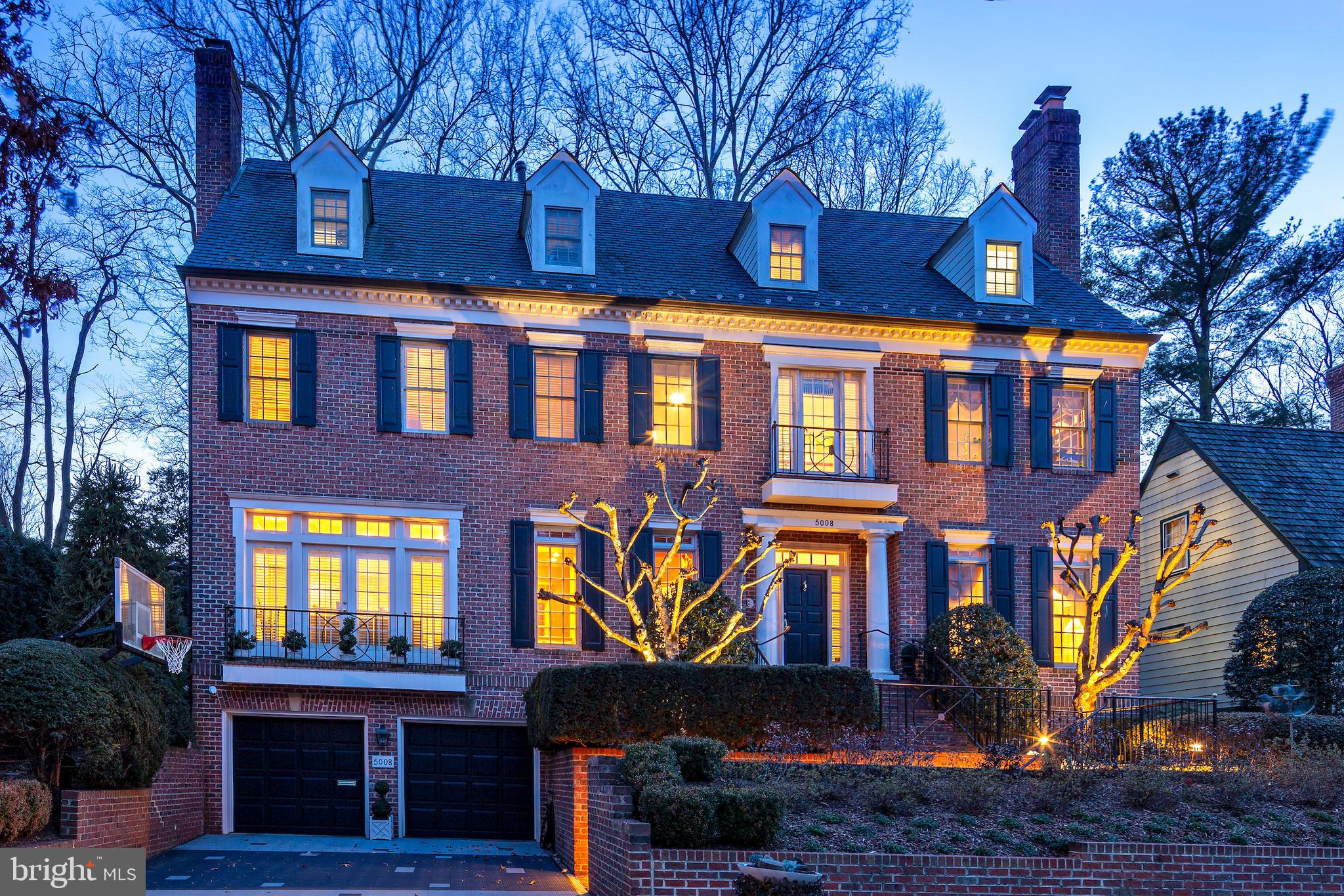 The Sumner home you have always admired is on the market! Newly refreshed with an updated basement with new paint and wood grain LVP floors, updated rooms (wallpaper removed & painted) and abundant natural light streaming through the walls of windows! This stunning colonial, with its striking brick facade and vibrant tulips, exudes irresistible curb appeal that catches the eye of everyone that passes by. Spanning an impressive 7100+sq ft, this luxurious residence, with soaring 9' and 10'3" ceilings, features 5-6 spacious bedrooms, 5 full and 2 half baths, with a two-car garage and remarkable expansions and addition by the esteemed BOWA Builders, a top, nationally recognized, award winning designers and builders exemplifying the highest standards of construction and design.

Experience generous living spaces throughout, including two versatile offices or dens, a state-of-the-art gym, a welcoming family room with a stone fireplace, an elegant formal living room complete with another fireplace, a well-appointed lower-level recreation room and guest room, and a stunning year-round sunroom that showcases breathtaking views of the inviting rear yard. The gourmet chef's kitchen is a culinary dream, featuring dual dishwashers, top-tier appliances, and exquisite stone countertops.

Step through the floor-to-ceiling French doors to discover an outdoor oasis that is nothing short of spectacular. The award winning landscaped grounds offer a serene waterfall cascading into a tranquil pond, multiple terraces—including one with a full-sized outdoor gas fireplace—an outdoor kitchen, and professionally designed landscaping that transforms with the seasons, accentuated by strategically placed lighting that enchants both day and night.  A generator is a bonus as well! 

Be sure to review the impressive floor plan to fully appreciate the home’s exquisite dimensions. Conveniently located near vibrant shopping and dining options, with easy access via Sangamore Road to Washington, DC, or Bethesda, this remarkable home is truly a unique gem—a timeless "forever" home that promises to captivate and inspire for years to come.  There is a footpath a few homes down that brings you right up to the shopping center, playground and dog park- no need to drive there!  Whitman-Pyle-Wood Acres schools. Don’t miss your chance to make it yours!