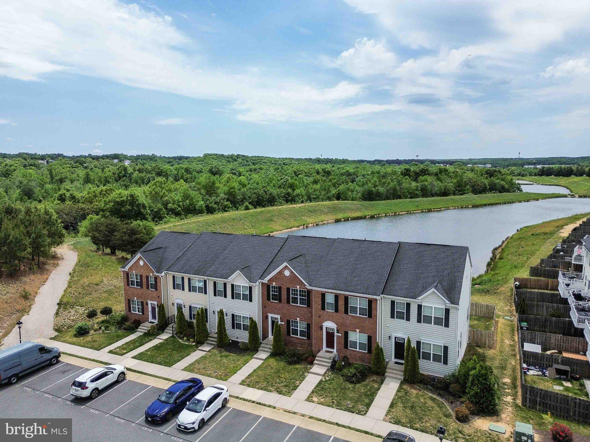 Beautiful water view townhome in the highly sought after Lakeside neighborhood/ Townhouse  4 bedrooms and 3 full baths one half bath. Guest room in the lower level/ walkout basement . nice kitchen, with island and eating area, nestled between two large living spaces, breathtaking water views and unwind on your back deck. This nestled neighborhood also has a playground and numerous visitor parking spaces Located just minutes from I-95, yet tucked away in a tranquil setting, you’ll enjoy easy access to shopping, dining, and medical facilities—all within walking distance!