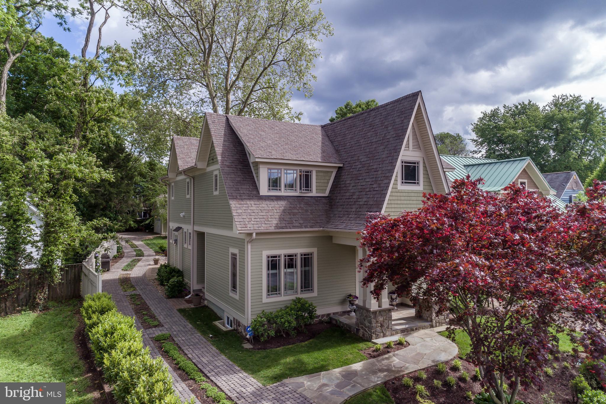Pristine arts & crafts home situated on the coveted Eastport peninsula.  This home sits on a beautifully landscaped lot just across from Spa Creek.  The large, open interior design offers 9  coffered ceilings, custom wainscoting and crown molding throughout, gorgeous wide-planked hardwood floors, built-in cabinetry & bookshelves, custom plantation shutters a gas fireplace with custom built mantel and lovely screened porch with vaulted ceiling.  The gourmet chef s kitchen boasts custom cabinetry, Silestone countertops, a Wolf 6-burner dual-fuel range, Sub-Zero refrigerator, a built-in Advantium microwave/convection oven, GE Monogram wall oven, butler s pantry and wet bar with a wine fridge.  The spacious master bedroom leads to the en-suite master bath complete with heated floors, 2 vanities, an oversized river-rock shower, 2 walk-in closets and a dressing area.  The serene backyard oasis features a pergola and large patio, perfect for entertaining.  Paver driveway leads to a detached 2-car garage.  Walk or take a water taxi to shopping or dining in downtown Annapolis or drop your kayak or paddle board into Spa Creek.
