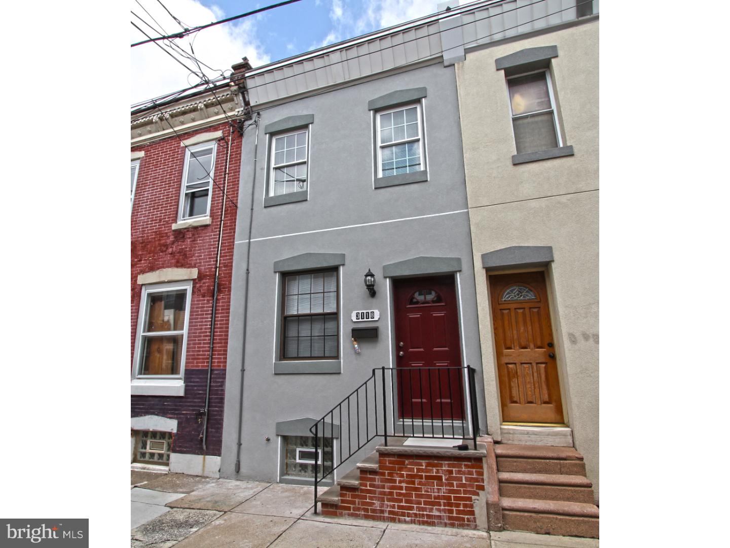 Located in the highly desired Port Richmond neighborhood is where this absolutely lovely home is located. Some features include: 3 bedrooms, 2 baths, a finished basement and yard with green space. Beautiful curb appeal and a completely renovated interior is what you can expect on your visit to this home. Enter in to a living room and dining room with crown molding, and that open layout we all love. Plus the staircase has open stair rails that really make the 1st floor feel expansive and give a dramatic feel to this main level. There are sustainable variety of bamboo floors throughout the home and modern tile selections on the floors in the kitchen and baths. There is a galley style gourmet kitchen with all stainless appliances, granite counters and pristine wood cabinetry with that sophisticated trim work finish. The subway tile backsplash is expertly paired with the kitchen design. In the rear of the kitchen is a large laundry room and full bath with shower enclosure, a medicine cabinet and custom tile work. Access to the private fenced in rear yard is also through the rear of the home. The 2nd floor has 2 mid size bedrooms and a large master bedroom and the hall bath is very large fitted with a storage vanity and custom tile. This home has central air, ceiling fans and full tiled finished basement with crawl space.