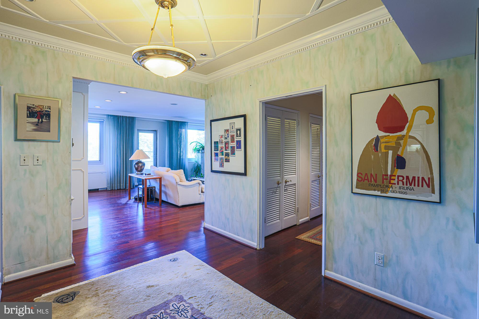 Welcome to Eleven Slade in Pikesville! This rare corner apartment features beautiful wood floors, custom-built ins, and accent moldings. It includes three spacious bedrooms, one of which serves as an open den that is perfect for a home office. The generous balcony allows plenty of natural light to flow into the living and dining areas. You will also enjoy the convenience of having your own washer and dryer, along with ample storage space in the spacious pantry.

The apartment has two bathrooms: the primary bathroom includes a walk-in accessible tub, while the second features a steam shower. The bright eat-in kitchen, equipped with a window above the sink, boasts granite countertops, double ovens, ample cabinet space, and a Sub-Zero refrigerator.

Residents can access both the front and back lobbies, with the back lobby showcasing a cozy fireplace that opens up to a large outdoor patio. Safety and convenience are prioritized, with a welcoming front desk and a friendly doorman to assist residents.

The co-op fee covers essential services such as cable, heating, air conditioning, water, and taxes. This charming co-op home in Baltimore County requires a cash purchase and board approval.

See if this apartment feels like the right fit for you!