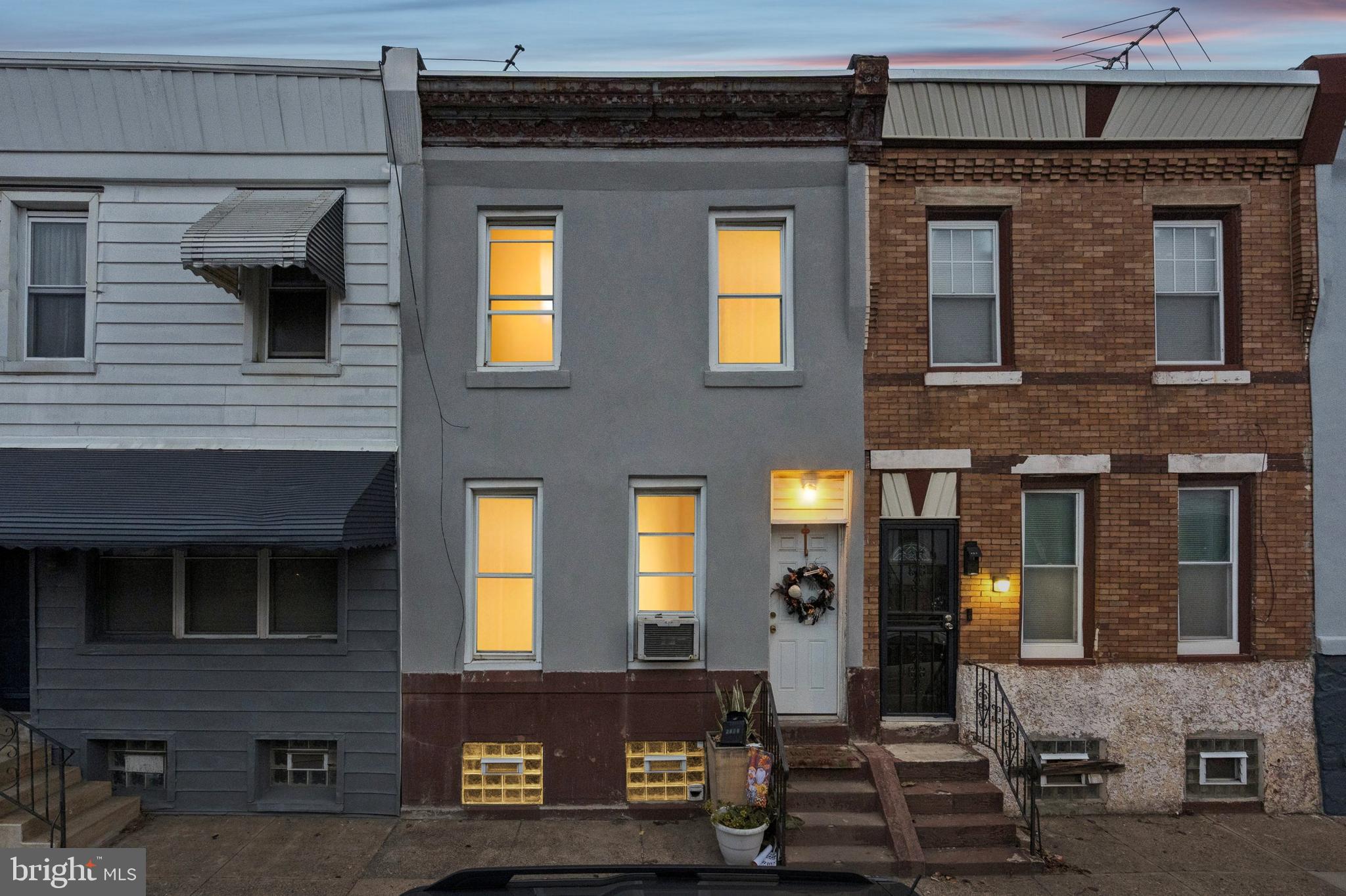 Welcome to 2808 Memphis Street, a classic-Philly rowhome offering generous interior space, charm, and value, with an open floor plan, decorative columns, an original wood banister, exposed brick, an original mantle, easy-maintenance tile floors on the main level, and LVP upstairs. The eat-in kitchen is fully functional and ready for updates to your liking, with three bedrooms and one full bath on the upper level and a large basement for storage; the boiler was replaced in 2014. Located in the heart of a new construction boom in Port Richmond, this home is just a short walk from neighborhood favorites like Tacconelli's Pizza, Nemi, and Gaul & Co., and convenient to I-95 and the big-box shopping corridor on Aramingo Avenue, this home offers an unbeatable blend of character, walkability, and everyday practicality.