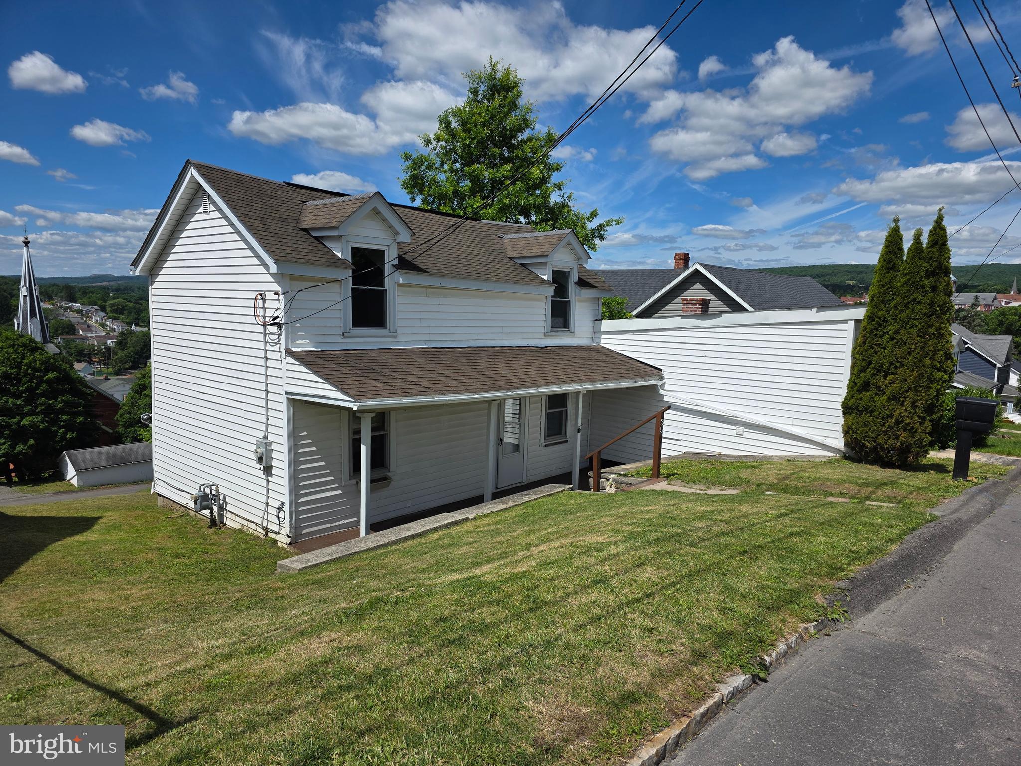 Welcome to 35 Mount Pleasant Street in Frostburg, Maryland — a charming home offering comfort, convenience, and incredible views! This property features 2–3 bedrooms and 2 full baths, giving you flexibility for bedrooms, a home office, guest space, or additional living needs.  Step inside to find a large eat-in kitchen with appliances conveying, making meal prep and everyday living easy. The separate dining room overlooks the spacious rear yard, creating the perfect setting for family dinners, morning coffee, or simply enjoying the peaceful scenery. Nice rear Trex Deck!  And the views? They are absolutely incredible!  The home also offers a full basement, ideal for storage, a workshop area, or future possibilities. Located close to downtown Frostburg, shopping, restaurants, and Frostburg State University, this home puts you near everything while still offering a comfortable place to call your own.  Whether you are a first-time buyer, downsizing, or looking for a potential investment opportunity, this home is one you will not want to miss.  Priced to sell — call today to schedule your private showing!
