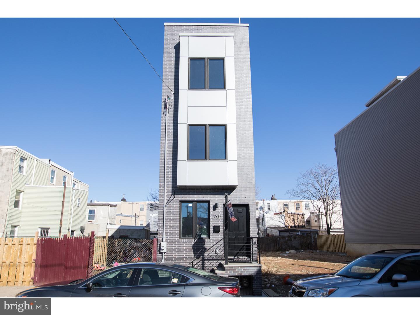 Slated for January 1 2018 delivery, 2007 E Hazzard St. is being passionately built by the EMES Development Team! This Fishtown home will include a full 3rd story master suite, a roof deck stretching the home's full footprint, and a full finished basement. Did we mention the 10-year tax abatement?! This home will boast a contemporary design with modern finishes and features over 2,300 sqft of fabulousness, including 3 bedrooms, a den, 2.5 bathrooms, 9+ foot ceilings, a custom Chef's kitchen with an island and quartz countertops, high-efficiency HVAC, hardwood flooring, and recessed lighting throughout. There's even a rear yard! The first floor features an open floor plan living/dining area, a full kitchen equipped with energy-efficient stainless appliances, rear yard access, storage, and access to the full finished basement with a powder room. The second floor features 2 large bedrooms with closets and a full bathroom with a custom tiled bath/shower. The third floor features the master bedroom suite, designed with effusive natural light throughout. This floor comes complete with a den space, a large walk-in closet, oversized windows and a master bath equipped with dual vanities and a glass-enclosed shower with custom tile. The hallway on the third floor takes you to the roof deck pilot house. Conveniently located and within walking distance to all that Fishtown has to offer, including public transportation, shopping, most area bridges, parks, and the entrance to i95. Center City is just minutes away. This home is outstanding and we hope you visit soon! New construction in the area can exceed 400k, so this property will not last long. Client may choose Finishes (Contact Co-List Agent for Deadline). Includes 1 Year builders warranty. Note: Photos shown are of interior from a recently sold property built by the owners.