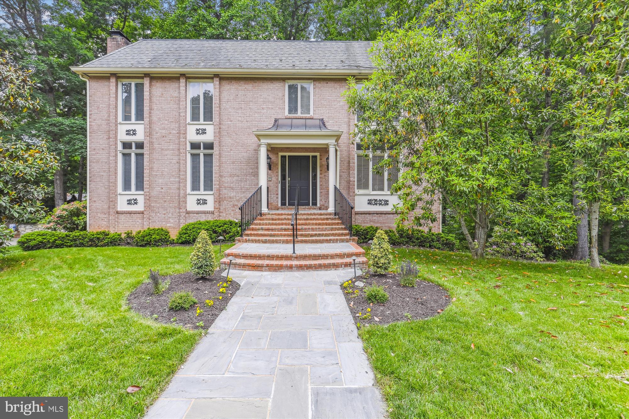 New to market and move-in ready - Show stopping home in the beautiful and sought after Chain Bridge Forest community. This home boasts 5 bedrooms, 4.5 baths, with over 4,000 square feet across 3 levels. Enjoy the wonderful light throughout this house accentuated by the high ceilings on every floor. The traditional yet modern floor plan holds many options for the new owner's use. Check out the video walkthrough!

 

To the right of the foyer is a front parlor perfect for a home office or library. To the left sits a large living room with a gas fireplace surrounded by an elegant mantle leading into a generous sized dining room. The tastefully renovated kitchen is both modern and functional whether you are an aspiring chef or simply enjoy hosting gatherings. This kitchen is sure to impress with its additional breakfast area and direct access to a private, elevated back deck.

 

Upstairs, you will find 4 bedrooms and 3 full baths. One of the many standout features is the primary suite with a very generous private sitting area plus a second gas fireplace. Through the sitting area and past the two spacious walk-in closets, you enter the private primary bedroom with large en-suite bathroom containing two vanities, a soaking tub, separate shower, and even a bidet! The layout of this suite has the bedroom obscured from the view of the hallway, offering a private oasis after a long day. The windows in the suite show the lush backyard, surrounding you with the beauty of old growth trees.

 

This lower level of the home is equally as impressive having yet another very large living room with fireplace, spacious bedroom, and its own full bathroom.  This area adds the flexibility for an in-law suite, accommodating guests, or providing another private retreat for family members. This lower level also has sliding glass doors granting access to two back patios (one crafted from wood and the other from stone).  In addition there is a large storage room with additional refrigerator and the attached 2 car garage with plenty of room for a workbench. Outside, the front yard boasts a magnificent magnolia tree that adds elegance and character to the home's appeal. These multiple outdoor spaces are perfect for relaxing, entertaining guests, and savoring the tranquility of the surrounding environment.



The home is in a coveted community, with easy access to all of Northern Virginia and a short trip down the Parkway from Georgetown and Washington, DC. The convenience of a quick commute and all the city has to offer!  Experience a harmonious blend of comfort, convenience, and natural beauty, making this a perfect place to call home. The home is available for showings and a bonus feature of a walk thru video available through the virtual tour, as well.