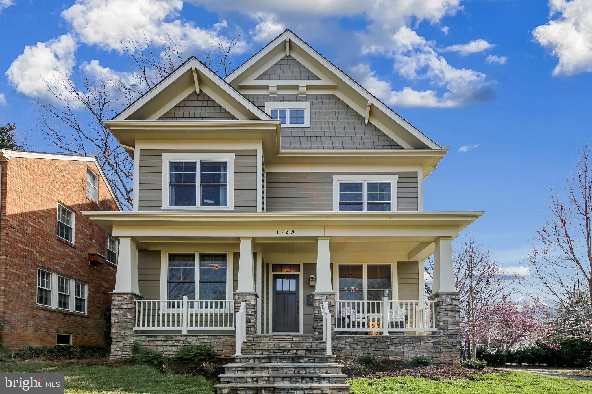 ELEGANT, IMMACULATE and quite SPECTACULAR!  Come and see for yourself.  From the covered front porch where you can enjoy the quiet neighborhood to the gourmet kitchen with HUGE ISLAND and breakfast bar OPEN to the Great Room/Family Room to the HUGE walk-up basement with an in-law/nanny suite to the generously sized master bedroom retreat you will be impressed.  The home boasts 9 foot ceilings on EACH level, a main level fire place and office as well as a true entertainment-sized formal dining room.  In addition to a bedroom level laundry room, the basement has a walk-up exit, legal bedroom with an attached full bath and TWO storage rooms.  The location is unbeatable - One block to Lacey Woods Park, walking distance to Westover and the Metro, convenient to I-66, and within sought after school districts.  There's even a one-year home warranty!