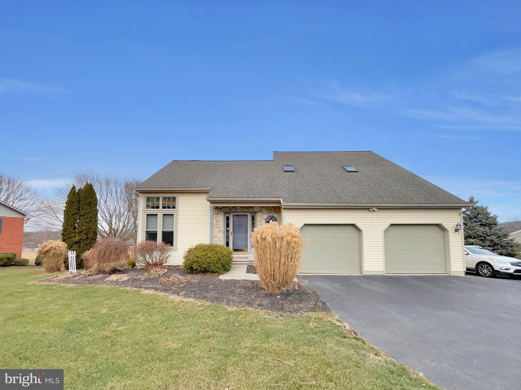 Charming 4 Bedroom and 3.5 Bathroom Contemporary Home with In-Law/ Guest Suite and Scenic Views in East Cocalico Township.  The curb appeal of this lovely property is evident from the moment that you pull up to this beautifully landscaped and well maintained home.  Step inside to a welcoming Entryway that opens to a spacious Family Room with vaulted ceilings, rich hardwood floors, and an abundance of natural light.   The bright, country Kitchen features ample cabinet space, as well as, a pantry.  The adjacent formal Dining Room provides room for Family gatherings or entertaining in addition to access to the backyard deck and beautiful surroundings.  The Primary Suite is on the Main Level and includes a large Bedroom, walk-in closet, and a private Bathroom with both a soaking tub and shower. The Lower Level features an In-Law or Guest Suite complete with a private Bedroom and Bathroom and offers flexibility for multi-generational living or hosting overnight visitors.  Upstairs, you’ll find 2 additional Bedrooms, a full Bathroom, and a Bonus Space ideal for a home office, library or exercise room.  Outside, you will enjoy outdoor living and the rural view on both the deck and patio.  The yard is fenced making it perfect for pets or play and the property enjoys mature landscaping.  Noteworthy features include a central vacuum, security system, newer furnace, complete water softener system.  Schedule your private showing today and come experience everything this charming property has to offer first-hand!
