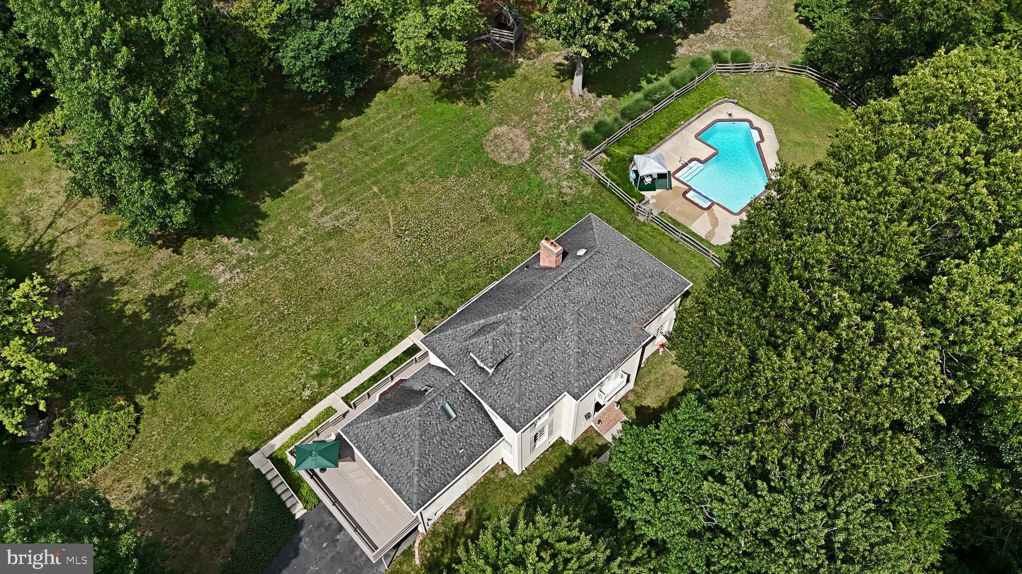 Welcome to this exceptional custom-built traditional home situated on a beautiful 2.03-acre lot in desirable Lower Pottsgrove Township, Montgomery County, within the highly regarded Pottsgrove School District. Built in 1981, this impressive residence offers 3 bedrooms, 3 full baths, 1 half bath, and over 4,800 square feet of finished living space, and additional 1,185 square feet in the finished lower level.

The spacious 23' x 23' kitchen serves as the heart of the home, featuring a large center island with vaulted ceilings, Corian countertops, a charming, exposed brick accent wall, built-in desk area, and two skylights that flood the space with natural light. The adjoining living room is highlighted by a fireplace and an abundance of windows, creating a warm and inviting setting for everyday living and entertaining. Main bathroom features a heated floor. 

Elegant formal spaces include a gracious dining room and an impressive foyer with Italian tile flooring. The private library offers custom built-in bookcases and a fireplace, providing the perfect space for a home office, reading room, or study. Rich wood detailing and quality craftsmanship are evident throughout the home. Walk-up attic with the potential for 2 additional bedrooms!

The finished lower level adds valuable living space, ideal for a recreation room, media room, fitness area, or guest accommodations. cedar closet.

Step outside to your own private resort-style backyard featuring an completely renovated  Anthony & Sylvan 24 x 42   in-ground pool 4 years ago, with attached spa/hot tub surrounded by mature landscaping and expansive grounds. The 2.03-acre setting offers privacy, tranquility, and plenty of room to enjoy the outdoors.

Conveniently located near major commuter routes, shopping, dining, and local parks, this distinctive Lower Pottsgrove property offers the perfect blend of timeless elegance, comfortable living, and exceptional outdoor amenities.