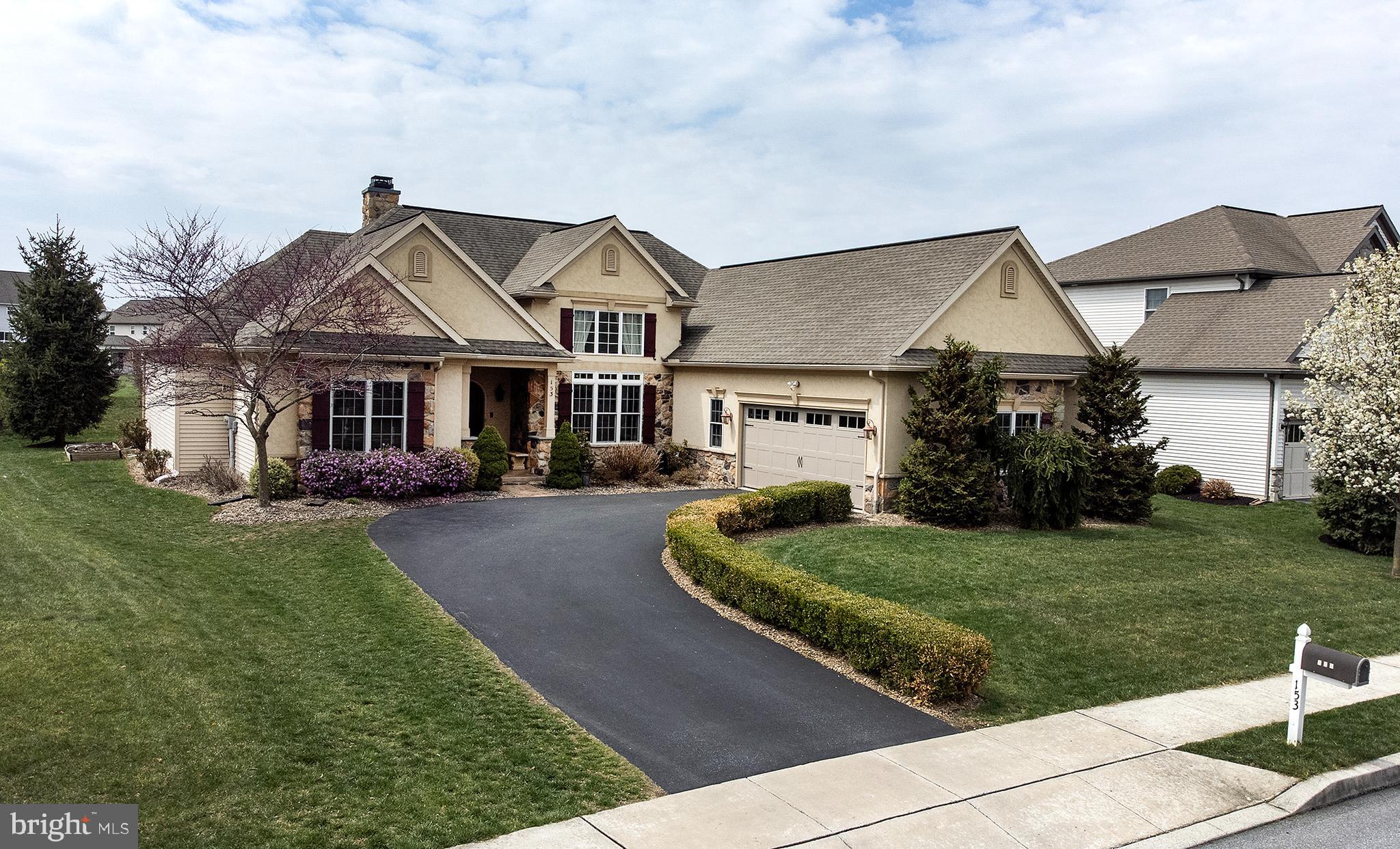 Welcome to Ridgewood. This Mediterranean inspired custom built ranch w/endless high end finishes throughout is for sale.  Open floorplan features a chef's kitchen, 14 ft ceilings in the family/dining rm, wood fireplace, study, 3 bedrooms, 2 full baths. Master suite w/steam rain shower. Stamped patio w/french doors from master & family rm. Appointments include wood & travertine floors, granite, chef's appliances, mouldings galore ,custom painting, window treatments, tray & coffered ceilings & built in bookcases. The lower level is finished and adds more space to this fantastic ranch with a great room, bedroom, full bathroom and countertop bar area. You will also find unfinished storage area and crawl space. Come explore what this Landmark built home has to offer.