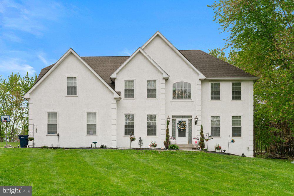 Welcome home to 32 Meadow Lane, a truly exceptional  residence set on 2.4 private acres in East Coventry, within the highly regarded Owen J. Roberts School District. As you pull up the long private driveway, you’re greeted by a beautifully transformed property featuring a 3‑car garage, all‑newer front windows, exterior paint, new garage motors, and metallic‑epoxy garage floor. The outdoor spaces is equally impressive, with two flagstone patios, a pergola, extensive tree removal, and full yard regrading for ideal drainage. Inside, the home offers a fully finished basement with a large two‑tier custom bar, a built‑in fish tank under the stairs, a bathroom and a dedicated movie theater with a motorized dropdown screen and high‑end surround sound. The second floor showcases a luxurious expanded primary suite featuring a three‑head walk‑in shower with a fish‑tank niche, a whirlpool tub, dual vanities. Bluetooth‑enabled color‑changing fans, followed by three additional spacious bedrooms offering comfort and versatility for family or guests. Every room has been updated with flooring, paint, upgraded trim, new closet doors, and fully automated smart lighting compatible with Alexa and Google Assistant. The kitchen showcases high‑end Woodmark Supreme cabinetry, custom granite countertops, newer appliances, and upgraded lighting throughout. Major systems have been modernized with a 80‑gallon water heater, well tank, well pump, whole‑house UV filtration, a propane furnace, and cleaned ductwork. With California Closets in the primary suite, upgraded electrical throughout, and thoughtful enhancements in every corner, this home offers an unmatched blend of  technology, and comfort on a serene, expansive lot.