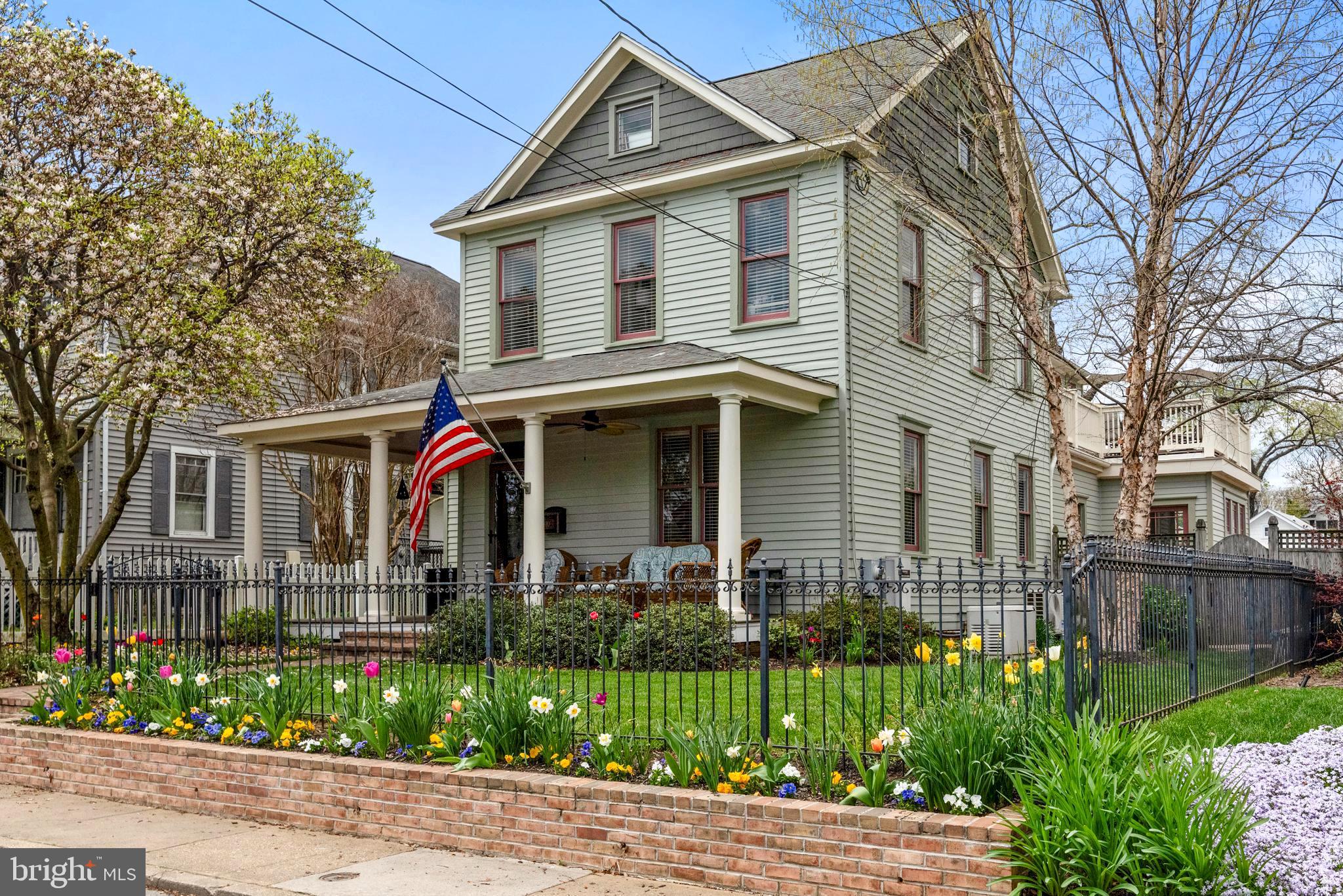 *Please Note: Tax record square footage is not correct. It is approximately 2,722 square feet.** Updated and Versatile Queen Anne- style gem in the heart of Eastport.  Additional Access via Emory G. Boden Alley provides ample parking adjacent to the large, landscaped, gated yard. Explore the opportunity to build your dream-ADU and garage in the future.  A gardener's dream; the front and rear yards are framed by flowers blooming year-round, with room in the side yard for a garden table and tools.  Multiple decks offer versatile entertainment, from watching the activity in the front yard, to enjoying the Blue Angels and relaxing on the upper level deck, to entertaining a larger party on the rear decks - one with a delightful retractable awning.  The interior provides the charm of the historic home with modern updates, recently sanded and stained wood flooring, and a rear great room adjoining the cook's kitchen with marble counters and backsplash, glass-front SubZero refrigerator, marble island with built-in chef's Boos cutting board., Viking wine refrigerator, Viking cooktop, Gaggenau double oven and Fisher & Paykel dishwashers.  Ample storage space in the open, side butler's pantry and bar.  The Great Room offers great light, a gas burning fireplace, a casual dining area, and views of the rear yard with access via french doors.  The fourth bedroom is on the main level, which can act as a library or guest bedroom.  It has a separate entrance if an an office with private access is needed.  The upper levels offer three bedrooms and two updated, full baths and laundry.  The Primary Suite offers access to the upper deck with Tigerwood decking, a large walk-in closet and a spacious bathroom with walk-in shower , private water closet, and separate tub. The basement has plenty of room for a workshop and storage, with finished stairs discreetly situated behind the great room.  Natural gas powered whole-house generator. 810 Chesapeake is just a few blocks from stores, restaurants, gyms, a bakery, and downtown Annapolis!