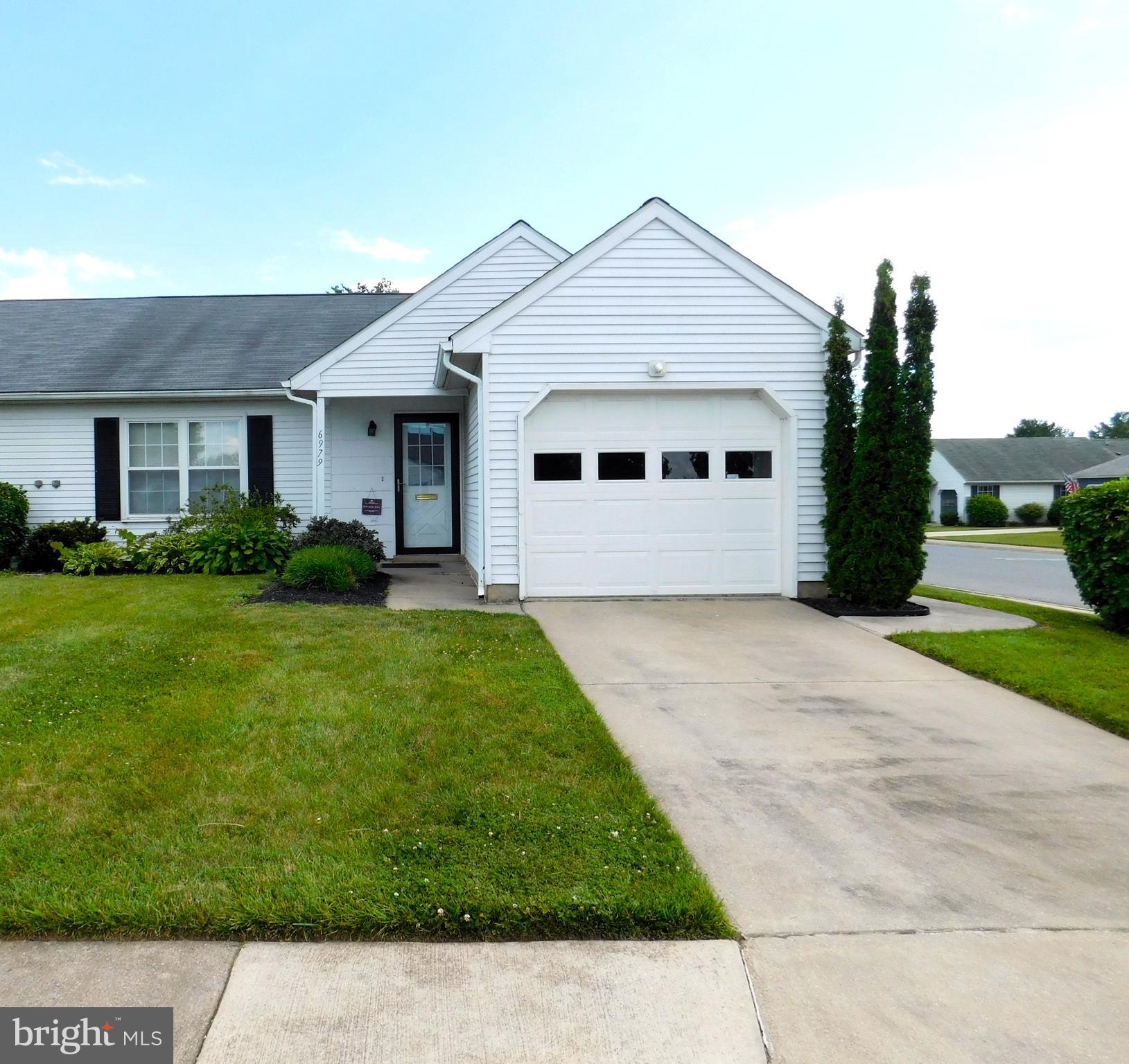 Large corner lot!  Beautiful Chesapeake Model, largest Duplex in Crestwood Village! This home is completely remodeled, new paint, luxury vinyl flooring throughout, updated and remodeled kitchen with stainless steel refrigerator and stainless steel farm house sink.  Kitchen has an area which can be used as an office and/or sitting room, full of light and an exit to an outside patio with a view.  Home is bright and beautiful, lots of windows and sunshine.  2 nice sized bedrooms, larger bedroom has a full bath with a gorgeous tile shower, hall bath has a bathtub.  Separate laundry room with newer washer and dryer (Maytag) and hot water heater. Hallway has pull attic stairs.  Large floor plan with a living room, dining room combo.  Home has a 1 car garage and is nicely landscaped.  This home is priced to sell and ready to move right in!  A must see!