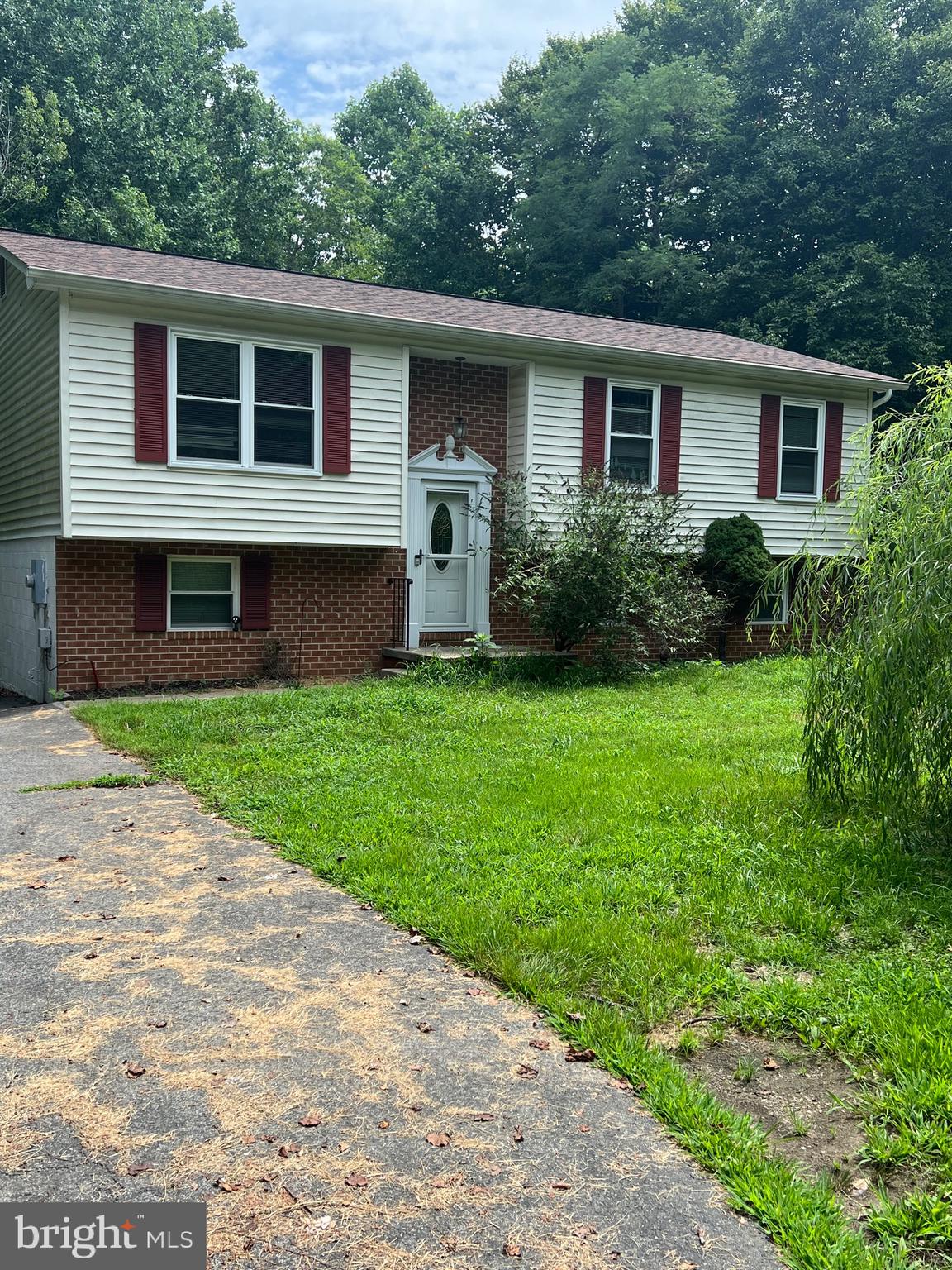 As Is estate sale. Home needs some TLC. Needs some clean up in the yard and flooring and paint. Kitchen appliances are older but work. Basement is finished with rec room, bedroom, bathroom and laundry room. Upstairs is has a large kitchen that opens to the breakfast room. Roof is fairly new and windows have been replaced. Just needs some TLC.