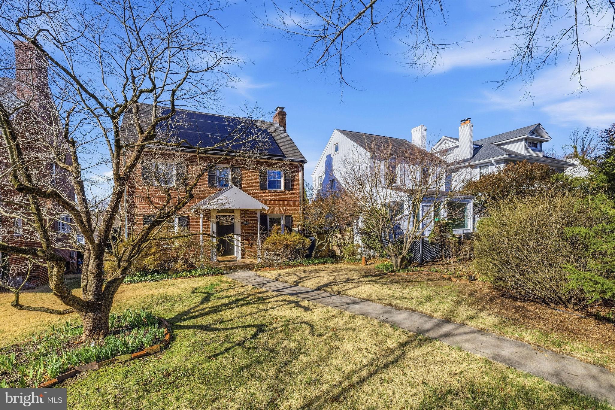 Now priced to sell and least expensive house in Spring Valley by far!  Open Sunday the 7th from 3-5 pm.  Quietly set back on one of Washington’s most prestigious avenues in gorgeous Spring Valley with Spring Valley Center barely 2 blocks away.  They have small children so it might not show its best.  The main level has a large living room with fireplace, dining room and recently renovated kitchen with induction range, powder room and enclosed porch/den.  The second floor has three bedrooms and two stylishly updated full baths.  There is also a 3rd floor walk-up attic and full basement with a 4th bedroom and 3rd full bath, family room, storage and utilities.  Deep rear yard with detached garage and additional parking too!