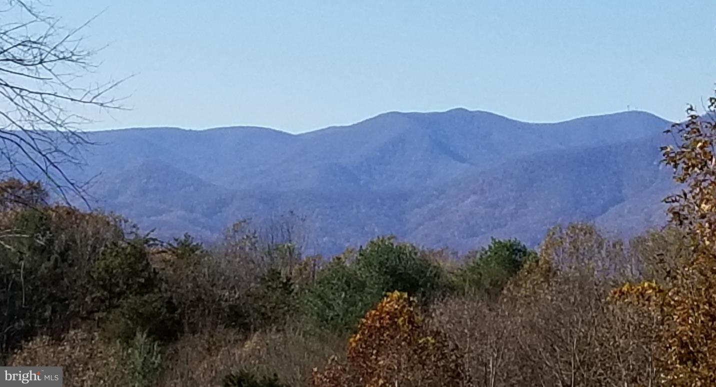 Come see the most sought after views in Madison County.  Build your dream.  The sky is the limit with this property.  This is a portion of 22-54 that has been added to 22-55.  Please see plat in Documents.