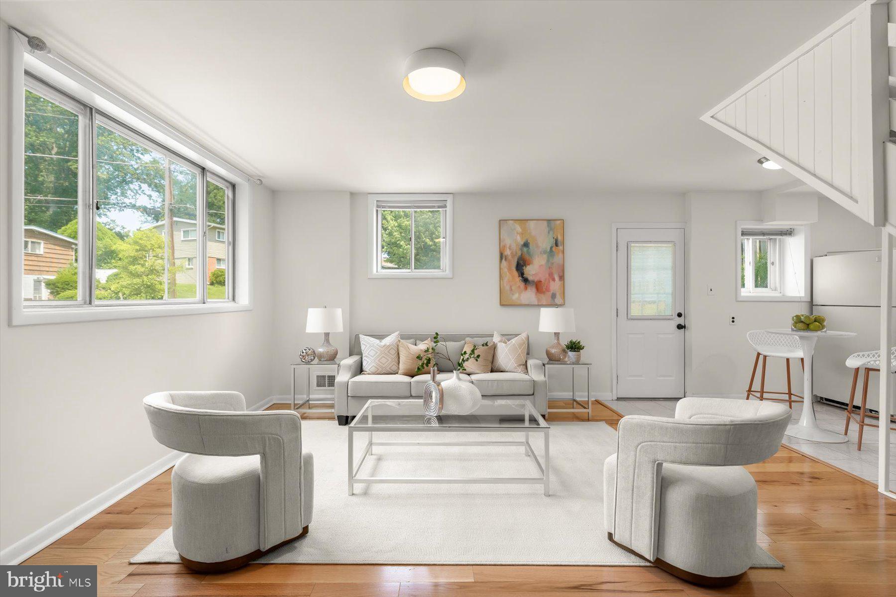 Situated on a cul-de-sac in Rock Creek Palisades, this well-designed, two-level house offers a comfortable blend of mid-century style, natural light, and everyday functionality.  The mature trees throughout the neighborhood offer a sense of privacy and a peaceful setting.  The interior offers everything you need for a comfortable lifestyle – abundant light on both levels, a layout that offers a natural division of space, and the feeling you can enjoy solitude if you choose.

The entry level has a cheerful, open family room, two bedrooms, a renovated bath, and laundry.  The upper level offers a sun-filled living and dining room, and a beautifully redone kitchen with lots of counter and storage space.  In addition, there are two bedrooms, one with a large walk-in closet making it an ideal primary bedroom, and a renovated bath.  The intimate deck is located just off the kitchen making it a perfect spot for outside entertaining, grilling, planting herbs, or dining al fresco.  

The location in Rock Creek Palisades is ideal: It offers a peaceful, established neighborhood situated along the wooded edge of Rock Creek Park plus proximity to all that Kensington has to offer – interesting restaurants, popular cafes and local boutiques, and for larger retail needs, the Westfield Wheaton shopping complex is nearby.  Residents enjoy easy access to parks, green space and numerous trails for running, biking and walking.  It is a location that balances tranquility, accessibility, and convenience.  Add to that a house that offers an ideal interior layout, a comfortable lifestyle and a price that makes it possible, and you’ll know why this one feels so right.