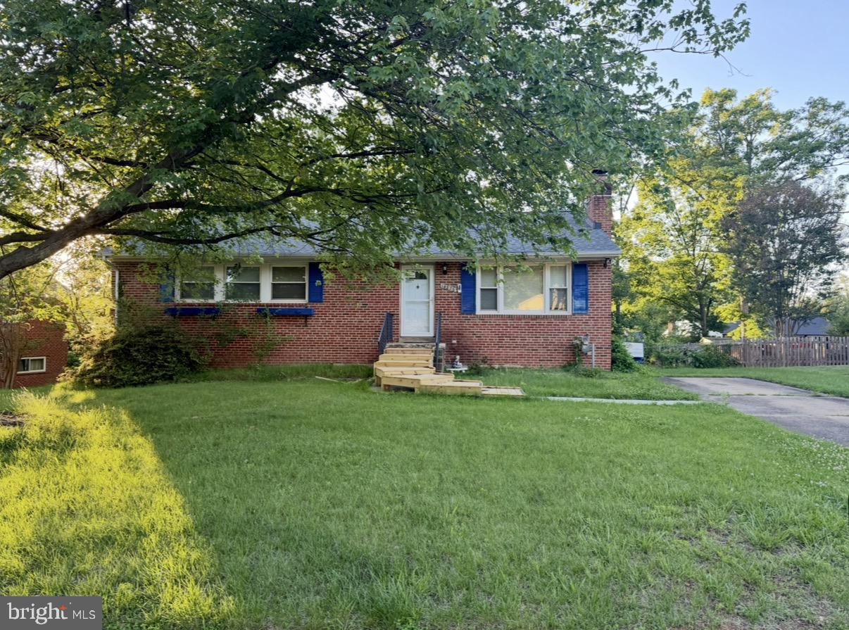 Rare opportunity to restore and add value to a solid all-brick home in a great location on a large, level lot. Features include two fireplaces, hardwood floors under the carpet on the main level, a new stove, and a new dishwasher. The walkout basement includes an additional full bath and offers excellent expansion potential (bath requires work and is not pictured). A sunroom off the rear of the home is also not pictured; the flooring has failed and will require repair. Workspace/storage area located beneath the sunroom.

Property is being sold strictly As-Is. Heirs will remove select personal items prior to closing; however, most remaining personal property is expected to convey with the sale.

Offers due NOON 6/8/26 & reviewed 6/9/26