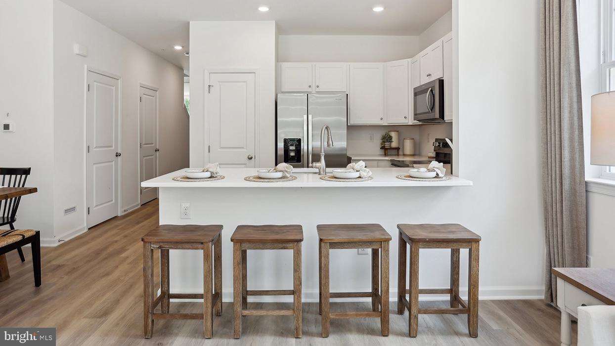 232 Derby is a west-facing homesite backing to a private tree line with morning sun in the backyard and shaded evenings. Tucked within a quiet circle with minimal through traffic, offering a peaceful, low-maintenance setting with added privacy. 
Discover "The Delmar," a smart and spacious two-story townhome designed for practical, contemporary living. Spanning 1,500 square feet, this thoughtfully crafted plan features 3 comfortable bedrooms, 2.5 stylish baths, and a convenient 1-car garage.
The main level presents an inviting open-concept layout. The modern eat-in kitchen boasts a large pantry, a functional central island, and seamlessly flows into the airy, sunlit dining and living areas—perfect for everyday life and entertaining.
Upstairs, retreat to the private living quarters. The comfortable owner’s suite includes a large walk-in closet and a private owner’s bath with a spacious walk-in shower and dual vanity. The two additional bedrooms offer ample closet storage, and the smart floor plan includes a convenient hall bath and an upstairs laundry area, making chores a breeze.
Experience the significant benefits of brand-new construction: peace of mind is guaranteed with a builder’s warranty. This home provides the low-maintenance lifestyle you desire with the solid amenities and design you deserve.
Priced for today's market and built for lasting comfort, The Delmar is waiting for you—schedule your tour today and explore the possibilities of homeownership!  *Photos are representatives and colors may vary.