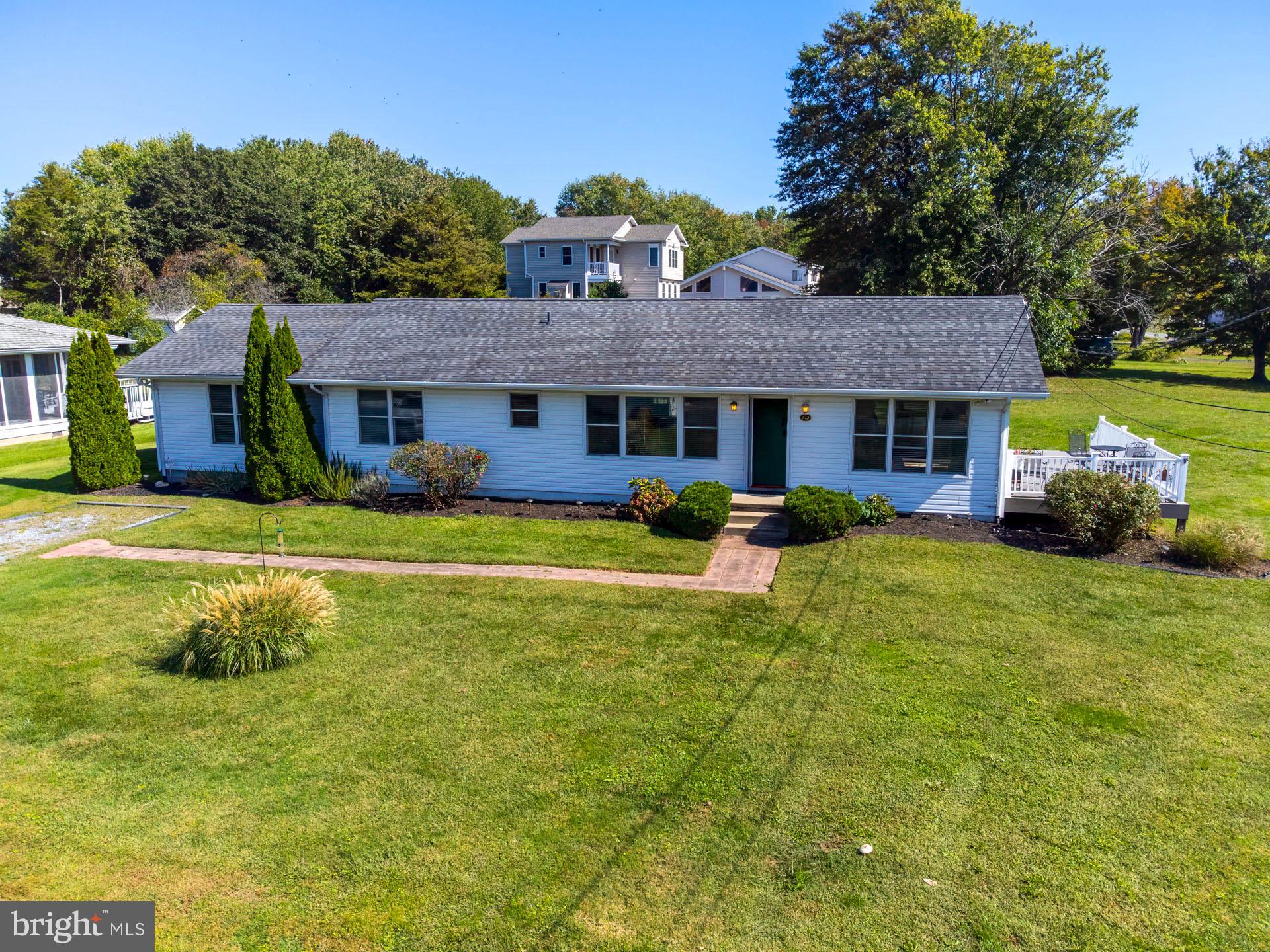 Don't miss this fantastic 3 bedroom, 2 bathroom Rancher with Water Views in Kent Island Estates. This home features an open layout providing views of the water from main living areas. House was completely renovated about 10 years ago and is improved with updated kitchen with granite, stainless steel appliances, center island, new bathrooms, roof, siding, and windows, and a large composite deck overlooking the cove. Public sewer! Huge yard (.91+/- acres), corner lot with partially fenced-in yard. Great location and easy access to the Bay Bridge.