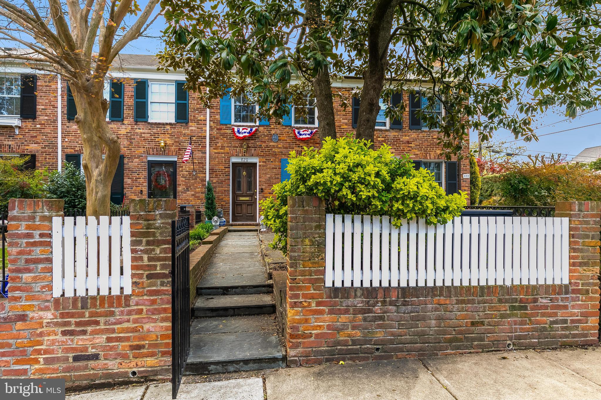 Welcome to 820 Green Street, an exquisite 2-bedroom, 2-bathroom row home that perfectly combines timeless charm with modern sophistication. Situated on a serene street in the heart of historic Old Town Alexandria, this residence invites you to experience refined living amidst the vibrant urban landscape.

Step inside to discover a meticulously updated interior. The kitchen gleams with state-of-the-art appliances, including a new custom built pantry, stove, dishwasher, and microwave, ensuring culinary excellence. The renovated basement offers versatility, transforming into a third bedroom, home office, or playroom, complete with fresh carpet, a modernized bathroom, and a laundry area.

Outdoors, relish in the expansive back patio—your personal oasis for entertaining with its retractable awning and cozy fire pit. The beautifully landscaped front yard, adorned with bluestone pavers, provides an additional retreat for relaxation.

Practical features abound with attic storage and ample on-street parking, while the proximity to public transportation enhances convenience. Embrace the vibrant lifestyle with a short stroll to Old Town's renowned shops, delectable dining, and scenic attractions like the Potomac waterfront and Mount Vernon Trail.

Recent home enhancements include a new water heater, elegant lighting fixtures, built-in shelves, and an updated pantry, collectively ensuring a modern, comfortable abode. Experience the allure of urban convenience intertwined with neighborhood charm at 820 Green Street.