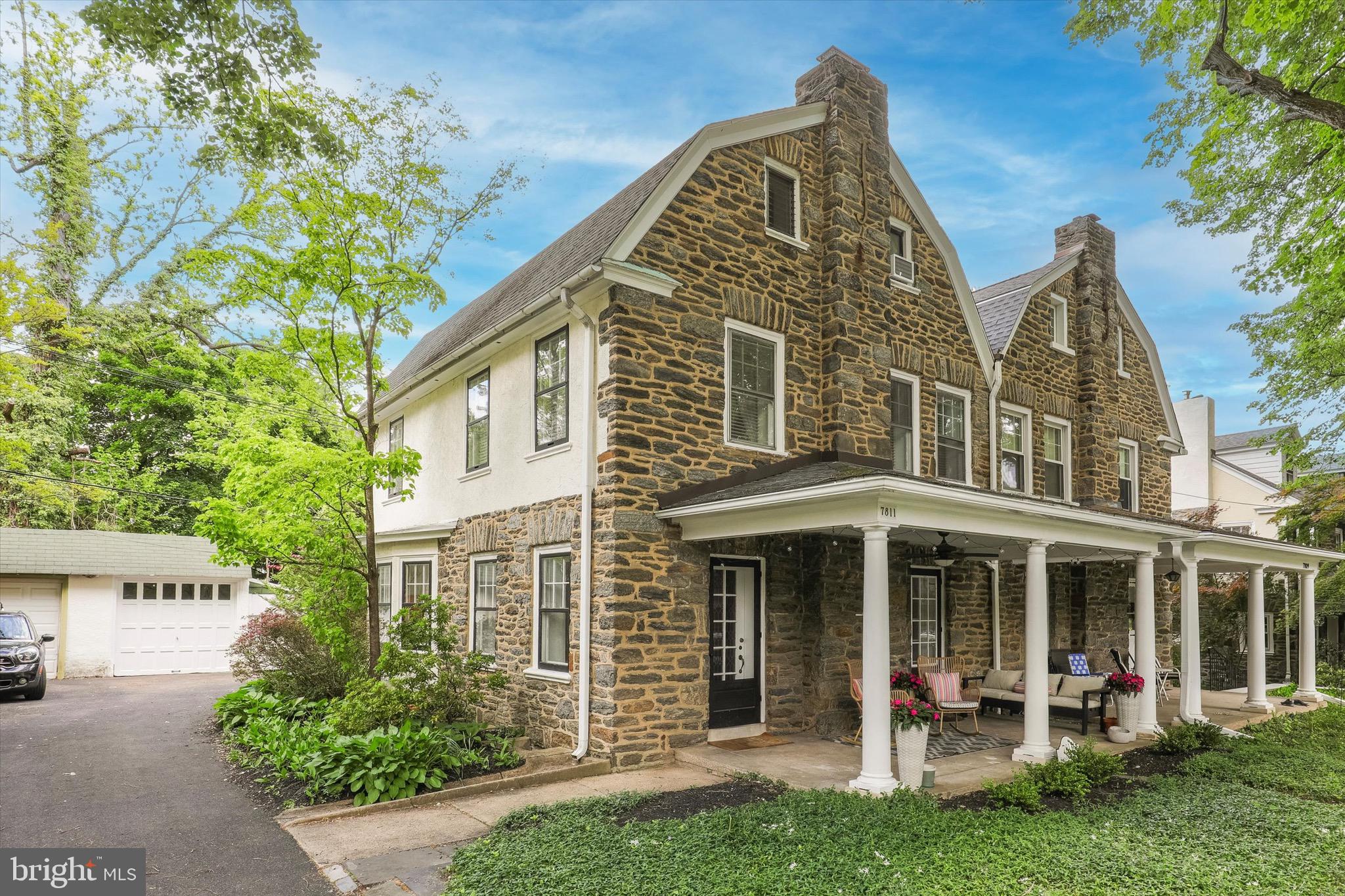 Nestled along a picturesque, tree-lined street in the highly desirable School District of Springfield Township, this timeless 1925 Wissahickon schist stone home beautifully blends classic character with thoughtful modern updates. Featuring 5 bedrooms and 2.5 updated bathrooms, this home offers warmth and charm to today’s modern lifestyle.

On the first floor, you’ll find stunning original oak hardwood floors with stunning inlay detailing. The updated kitchen features a breakfast bar leading into the sun-drenched dining room. Just off the rear entrance, a mudroom/storage area and powder room provide exceptional everyday functionality.

On the second floor you’ll find three bedrooms and a renovated full bathroom, along with plenty of closet space for storage. The third floor features two additional bedrooms, a cedar closet, and a beautifully appointed full bathroom with a stand-alone shower and a clawfoot tub.

Step outside to enjoy the covered front porch, with plenty of space for enjoying morning coffee, relaxing evenings, or connecting with neighbors in this warm and welcoming community. Majestic Linden trees line the entire block, creating an ideal outdoor environment. 

Ideally located within walking distance to the recently renovated Mermaid Park and beloved Elephant Park, plus the shops, restaurants, and grocery stores along Willow Grove Avenue, this home offers the perfect combination of neighborhood charm, convenience, and community. A rare opportunity to own a character-filled home in one of the area’s most coveted locations.