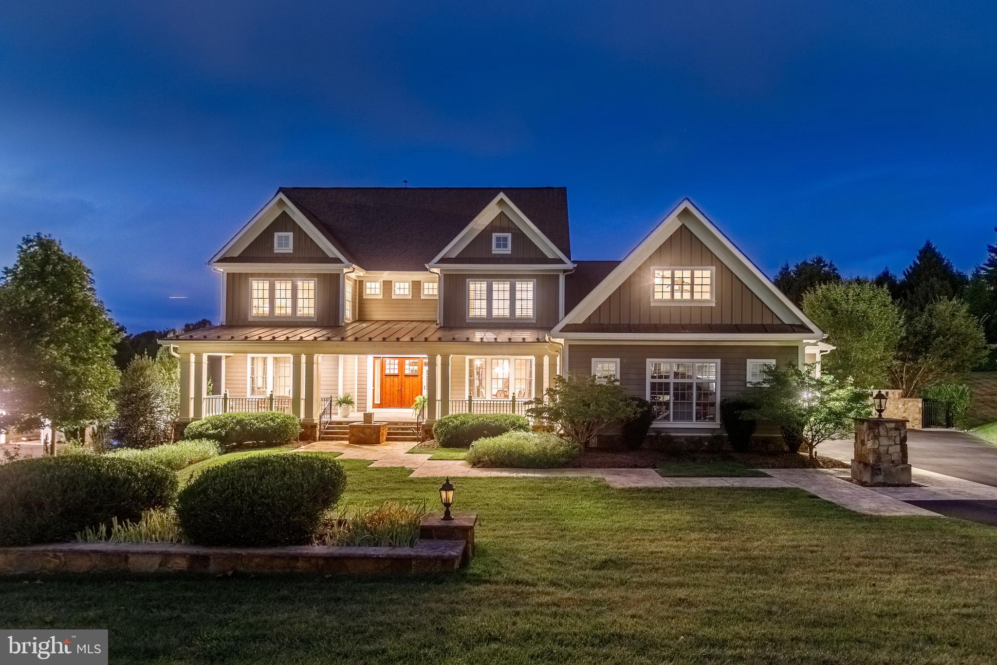 This Transitional beauty is a fresh take on traditional living while providing a more modern use of space. This custom home embodies a design, both modern and classic; sleek and warm; nostalgic and functional. The result of this blending is dramatic lighting, rich millwork, curved walls, graceful arches, and coffered and tray ceilings. There is a high level of finish throughout including hardwood floors, quartz countertops, marble floors and vanities, and window treatments. The Chef’s kitchen includes a six burner Wolf gas stove with pot filler, a Sub Zero refrigerator, a built in Miele Coffee Station, two dishwashers, two sinks, an additional wall oven and microwave, and two pantries. The perfect owner’s suite has a sitting area, a two sided fireplace, a luxurious bath, and two walk in closets (one leads to a bonus room). The lower level is designed for entertaining with an extra bedroom, three full baths and a powder room, an entertainment room, a large fully equipped bar, a game room and a changing area. The recreation room leads to a large stone patio and the manicured grounds, pool, and the spa. Water features, fire features - an oasis at home!
Builder's floor plan included an option for an elevator - could be added.