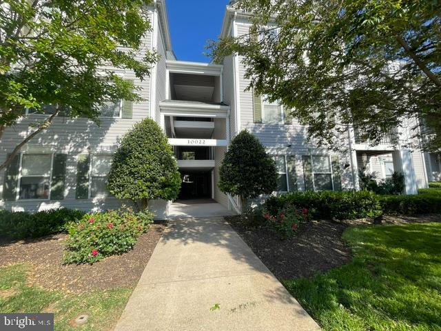 Wow! Rare 1st floor 3 bedroom, 2 bath end-unit condo. New paint,  new flooring, new kitchen counters. Open Living rm, Dining rm, Kitchen floor plan * Living Rm with gas fireplace * Private laundry area with washer and dryer.  Tennis courts and community pool. No steps, wider hallways & doors. Walk to restaurants/shopping. Mins from Shady Grove Metro and Rio.