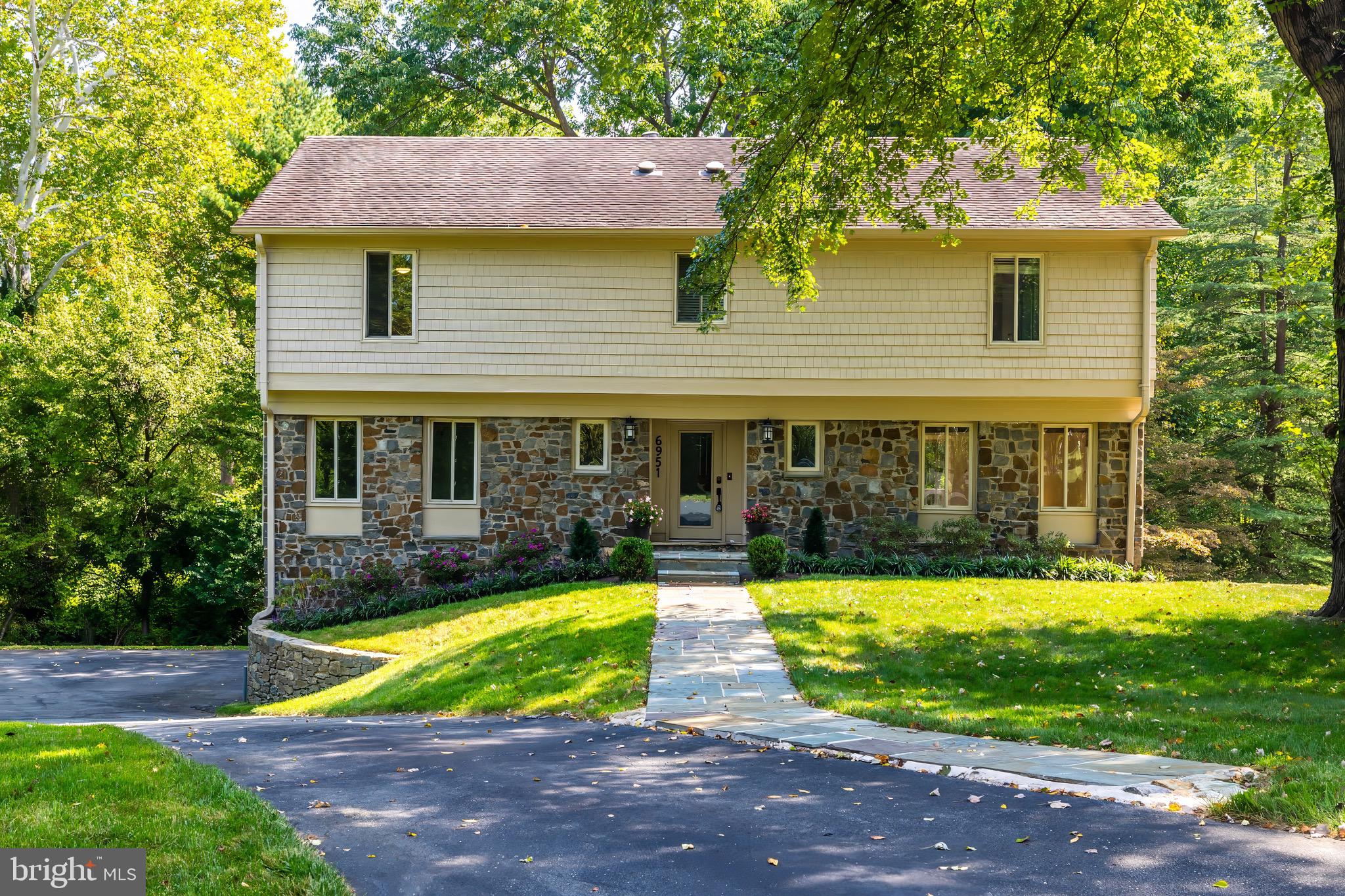 Welcome to 6951 Duncraig Court, a colonial located at the end of a quiet cul-de-sac on a beautiful almost acre lot backing to trees and Dead Run Stream.  Balmacara is privately tucked off Georgetown Pike in one of McLean's most desireable locations for its access to 495 and close proximity to Langley High School and Scotts Run hiking trails to the Potomac River. 

Upon entering, you are greeted by spacious and sunlit living areas, including formal living and dining rooms, along with a cozy family room featuring a charming fireplace. The gourmet kitchen is a chef’s delight, complete with high-end stainless steel appliances, granite countertops, custom cabinetry, and a large island—perfect for preparing meals or hosting gatherings. Throughout the home, hardwood floors and tasteful finishes create an atmosphere of refined elegance.

The expansive owner’s suite serves as a private retreat, boasting a spa-like ensuite bathroom, generous walk-in closets, and a sitting area. The fully finished walkout lower level provides additional living space, featuring a recreation room, an extra bedroom, and a full bath—ideal for guests, a home office, or a personal gym.

Step outside to the serene backyard, where a large deck and patio overlook lush, manicured landscaping. This outdoor oasis offers the perfect setting for al fresco dining and quiet relaxation.

Balmacara is a located in a very sought after location with easy access to Tysons, the Dulles Thech Corridor, Bethesda and the GW Parkway to Washington DC and is centrally located between Reagan National and Dulles International Airports.