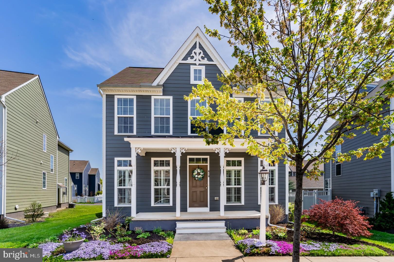 Welcome to this beautifully maintained home nestled in the sought-after Walden neighborhood, known for its tree-lined streets, walkability, and strong sense of community. Enjoy easy access to shopping, parks,  restaurants and a vibrant community center featuring a pool, community room and fitness center. Step inside to find hardwood flooring throughout the first floor, complemented by soaring 9ft ceilings and abundant natural light. A dedicated office with hardwoods offers the perfect space to work from home. The heart of the home is a gorgeous kitchen boasting white cabinetry, quartz countertops, a tiled backsplash, gas cooking, a spacious island, pantry, and recessed lighting—ideal for both everyday living and entertaining. Cozy up in the inviting living area featuring a gas fireplace with an accent wall and stylish plantation shutters. Upstairs, the generously sized primary ensuite includes a walk-in closet and a serene, private bath. The home is equipped with two zones for heating and cooling for year-round comfort. Outside, enjoy a fenced-in, landscaped yard complete with a stone patio and built-in fire pit—perfect for gathering with friends and family. A quaint front porch adds charm and curb appeal, while the 2-car attached garage with 10ft+ ceilings provides ample storage and convenience.  Solar panels on this home are on a Power Purchase Agreement. This home truly offers the best of comfort, style, and community living.