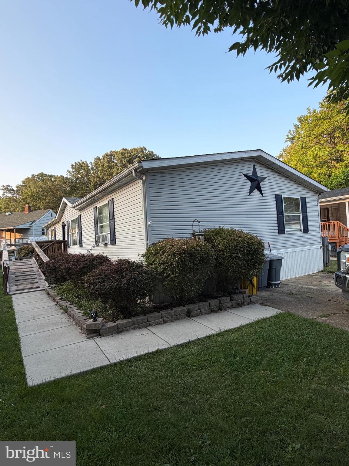 Great opportunity.  3 bed/2 bath.  some upgrades in the kitchen.  on of the first streets from the entrance. concrete driveway. big soaking tub and separate shower in the master bed. rear deck and yard. Big open family room. close to the entrance of the neighborhood. very large footprint, lot is in the center of the cul de sac.  long ramp from sidewalt to door.