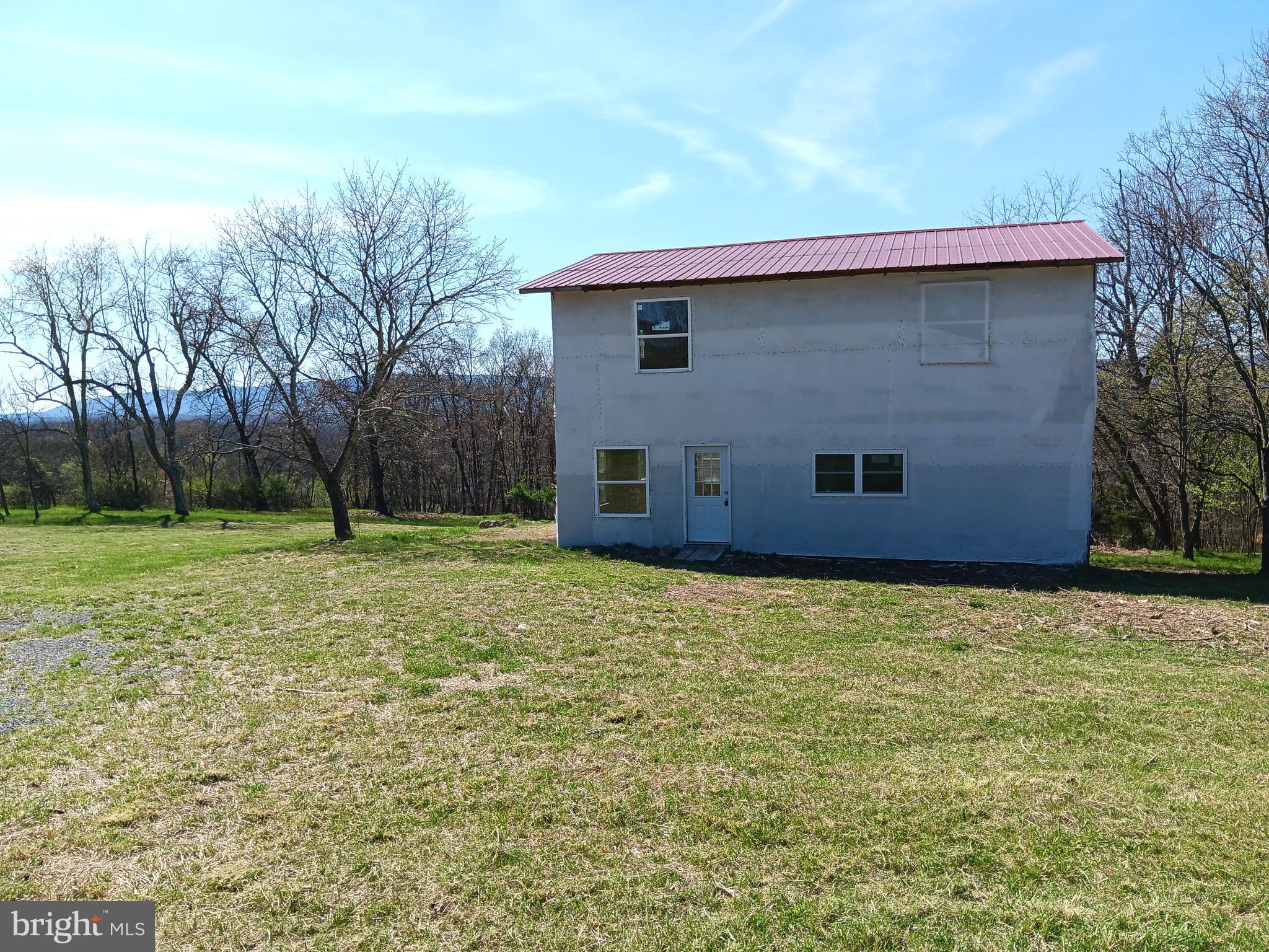 Welcome to 9432 Winchester Grade Rd. Nestled on 6.78 acres of gently rolling land with a wet weather stream at the back of the property. The home’s shell is ready for you to finish to your own tastes and preferences. Enjoy stunning sunrises and sunsets with mountain views in both directions, all while being conveniently located on a state-maintained road for easy access to Berkeley Springs, Winchester, Martinsburg, Cacapon State Park, and more. The property features an existing well and septic system, a home originally built in 1940 with much of the framing recently redone, a current layout appearing to feature 4 bedrooms and 3 full baths, and approximately 2,240 sq ft of space. This property is full of potential. Call today to schedule your showing.