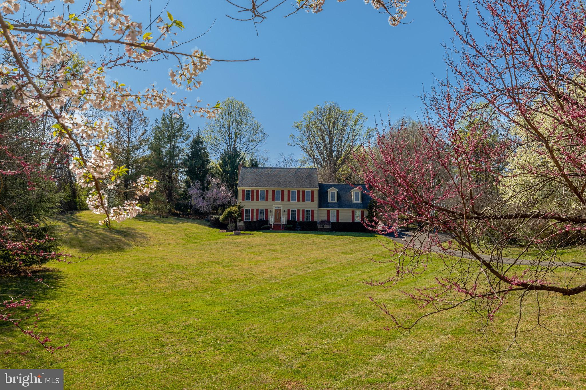 Sited on a grassy knoll on nearly 2 acres in the highly desirable Great Falls Meadows, this classic Colonial offers stunning views and luxurious living. The main level has been completely transformed with brand new hardwood floors, fresh paint, and elegant William Morris-style wallpaper in the formal dining room. The wall between the family room and living room has been removed, creating a large, open-concept space with plush new carpeting. The family room seamlessly flows into the kitchen and features French doors that lead to a large deck, perfect for enjoying the tranquil rear yard and picturesque vistas.

Upstairs, you'll find 4 spacious bedrooms and 2 bathrooms, with two of the bedrooms showcasing the beautiful William Morse-style wallpaper. Additionally, a large bonus room with a separate staircase provides added privacy and versatility. The home has been thoughtfully refreshed throughout, making it move-in ready and ideal for modern living.

The property is surrounded by peaceful, natural beauty. Don’t miss the opportunity to make this stunning home yours!