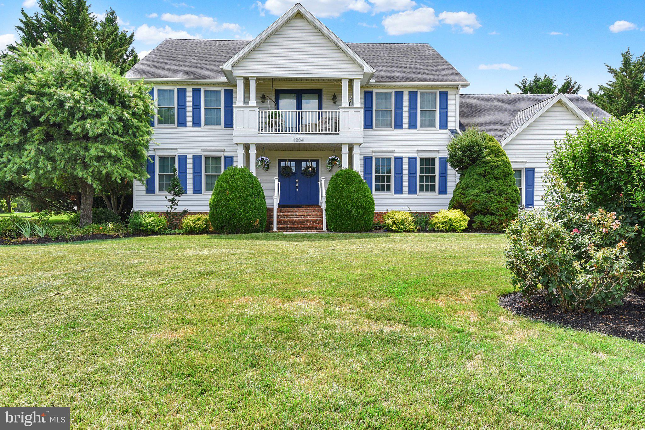 Set on a picturesque 1.2-acre lot, this impressive 3,460 SF residence blends space, comfort, and thoughtful design in all the right ways. A grand two-story Foyer welcomes you inside, showcasing gleaming hardwood floors accented by a marble inlay and an open staircase complete with a custom chair lift—offering both elegance and accessibility. The heart of the home is the expansive eat-in Kitchen, designed for both everyday living and entertaining. Featuring quartz countertops, a complementary tiled backsplash, abundant prep space, a center island with prep sink, breakfast bar, pantry, and a spacious dining area, this Kitchen truly delivers. Just beyond, a large covered, screened-in porch invites you to relax while enjoying peaceful, private backyard views. Flowing seamlessly from the Kitchen, the Family Room offers a warm and inviting space anchored by a corner gas fireplace with a heatilator. Formal Living and Dining rooms add a touch of sophistication with hard wood flooring and crown molding—perfect for hosting gatherings or quiet evenings. The main level also includes a private Office ideal for remote work, along with the convenience of first-floor Laundry Room, and 1/2 bath. Upstairs, the primary suite is a true retreat. The ensuite bath features a generously sized walk-in shower, corner whirlpool tub, double vanity, and a separate water closet. A standout feature is the adjoining private Sitting Room with balcony access—perfect as a reading nook, second office, or personal sanctuary. Three additional bedrooms provide ample space for overnight guests, two with walk-in closets, and are served by a well-appointed hall bath with ceramic tile flooring and double vanity. The full basement, constructed with engineered concrete walls, offers excellent storage or the opportunity to finish and expand your living space. A 3-car side-entry garage adds both functionality and curb appeal. 2 HVAC units offer economical gas heating. All appliances are conveyed, and the home’s location offers easy access to major highways and everyday conveniences. Spacious, versatile, and lovingly maintained—this is truly a wonderful place to call home. Schedule your showing today!
