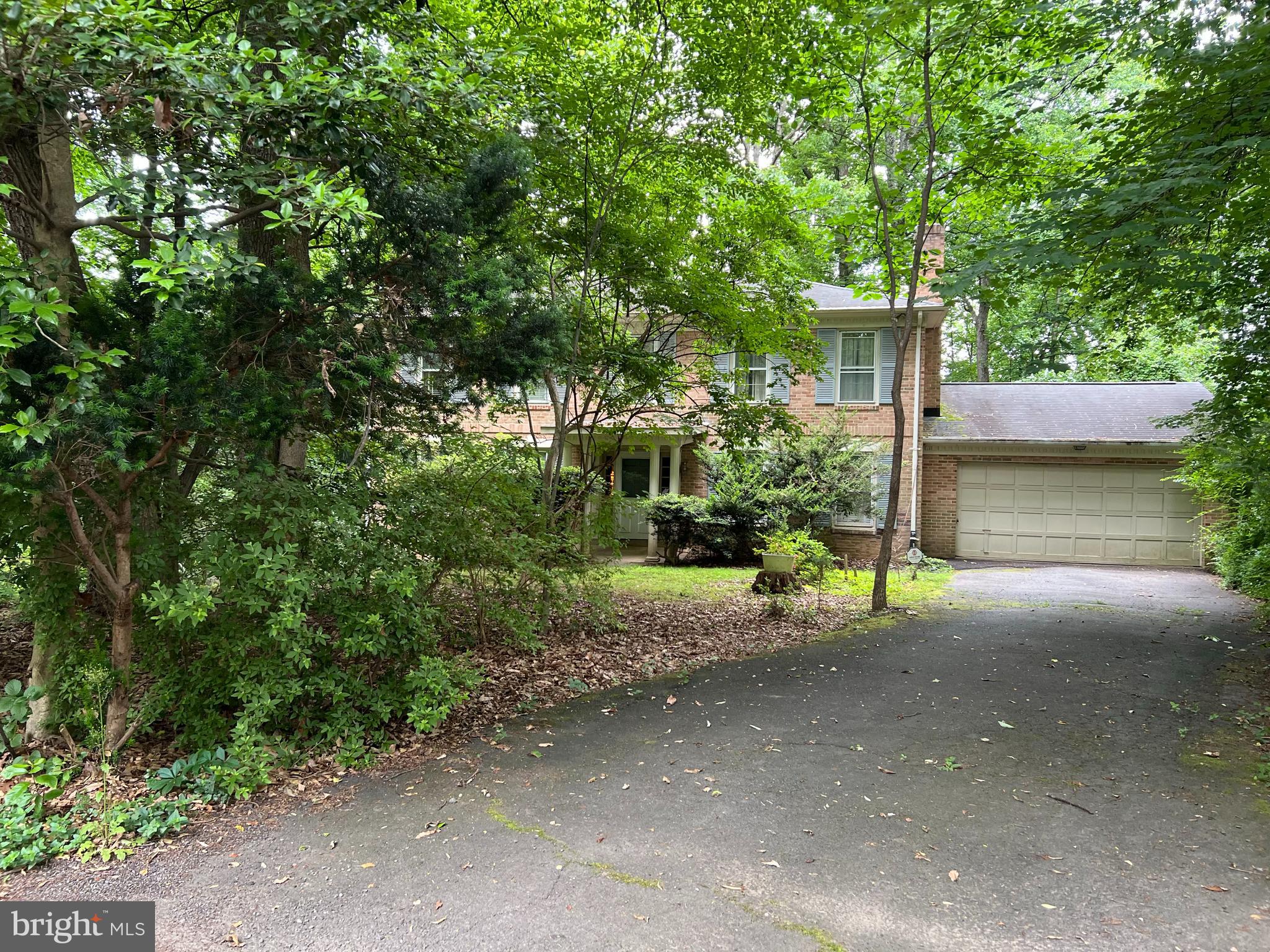 Value is in the land. Scenic land at end of cul-de-sac. Tear down and build your dream home here