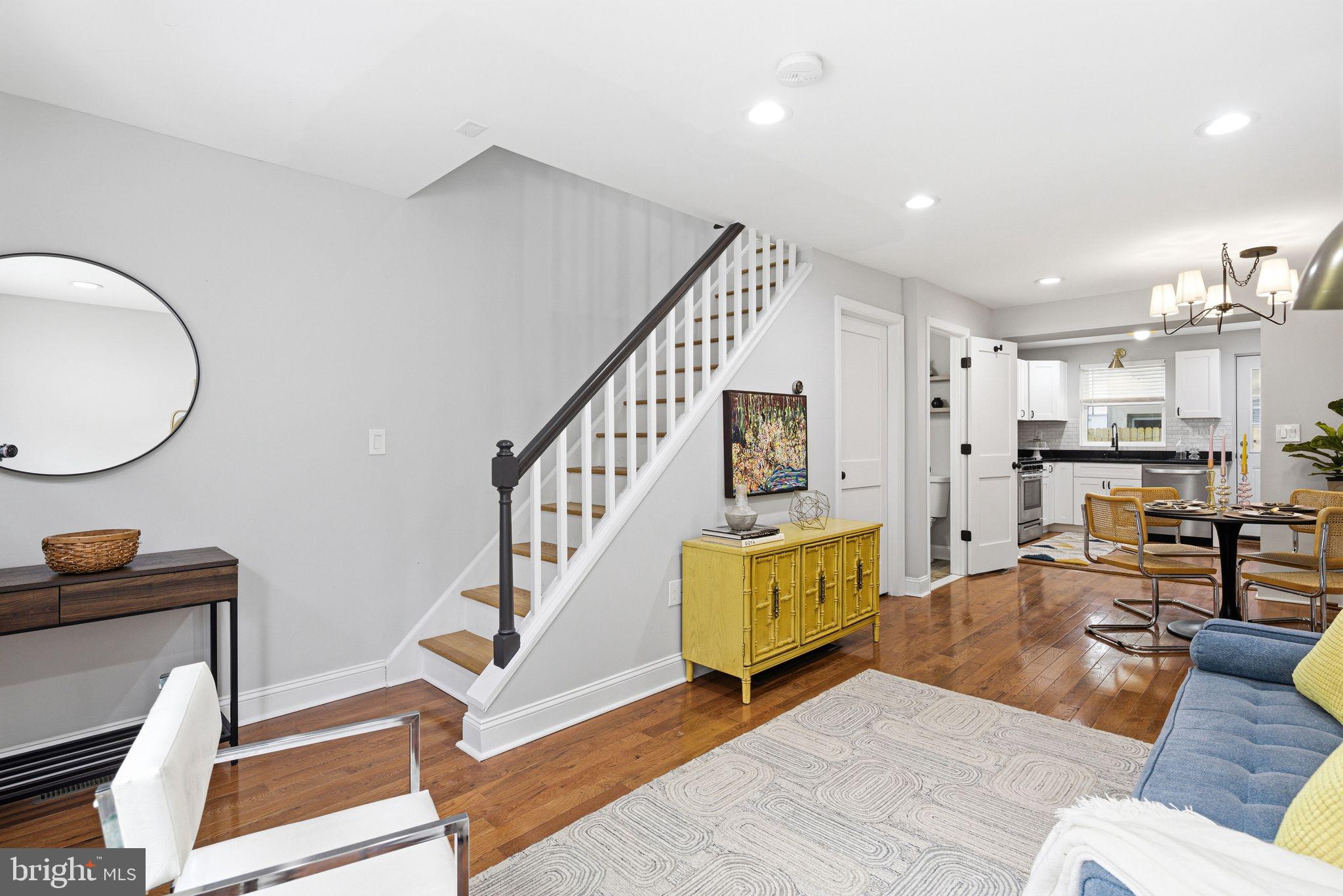 Don’t miss this outdoor oasis in South Philadelphia. Now, back to market with some necessary changes in closet space! Welcome to this beautifully updated 2-bedroom, 1.5-bath rowhome in the heart of South Philadelphia’s desirable Dickinson Narrows neighborhood. Perfectly positioned on an energetic, neighborly block between Pennsport and Passyunk Square, you’re just steps from vibrant Passyunk Avenue and all of its dining, shopping, and local charm. Fully renovated in 2020, the home offers modern comfort with thoughtful 2026 value-add upgrades throughout. A south-facing exposure fills the living room with natural sunlight, highlighting the hardwood floors and recessed lighting. The open layout flows seamlessly through the dining room into into a stylish kitchen featuring upgraded stainless steel appliances, black granite countertops, classic subway tile backsplash, and clean shaker-style cabinetry. Adjacent to the kitchen you’ll find a half bath powderoom for added convenience. Upstairs, you’ll find two well-proportioned bedrooms with LARGE closets incluing built in shelving unit. The full bathroom with new vanity and lighting, and the convenience of a full-size washer and dryer in the second floor laundry closet. Recent improvements elevate the home even further, including upgraded lighting, closets, and ceiling fan packages, solid shaker doors, enhanced closets and trim, custom window treatments, and matte black hardware throughout for a cohesive, modern finish.
The true standout—and a rare find in this location—is the exceptionally large private rear patio. Measuring approximately 15x15 feet, this fully enclosed outdoor space features a brand-new privacy fence and lighting, creating the perfect setting for entertaining, relaxing, or enjoying your own quiet retreat in the city.
A turnkey home with style, space, and an unbeatable location—this one checks every box. Listing agent has financial interest in the property/owner is a licensed real estate agent. Buyers and their agents are responsible for independently verifying tax details.