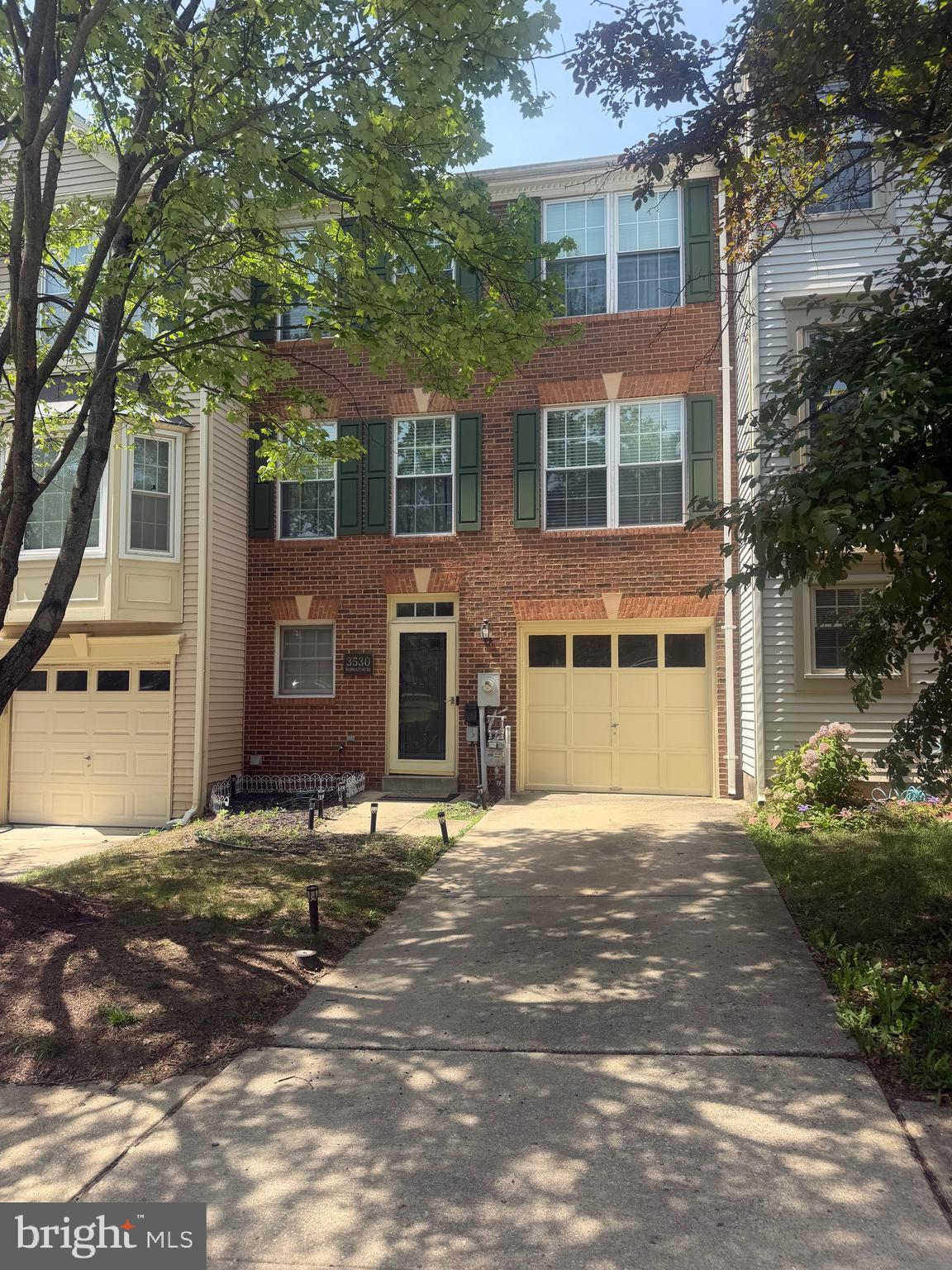 Welcome home to this spacious three-level townhome with a one-car garage, nestled in a desirable Laurel community surrounded by beautiful green space. Offering over three finished levels of comfortable living, this home provides the perfect opportunity to add your own style while enjoying a solid, well-maintained property.

The entry level features a welcoming family room with walk-out access to the backyard, a convenient half bath, laundry area, and direct access to the attached garage.

The main level is designed for both everyday living and entertaining, featuring an expansive living and dining room combination filled with natural light. The country-style kitchen offers an island, ample cabinet space, and easy access to the rear deck—perfect for morning coffee or outdoor dining.

Upstairs, you'll find three generously sized bedrooms and two full baths, including a spacious owner's suite complete with a walk-in closet and a private bath featuring dual vanities, a soaking tub, and a separate shower.

Conveniently located near shopping, restaurants, commuter routes, and the Beltway, this home combines space, location, and value in one of Laurel's most sought-after neighborhoods. With great bones and room to make it your own, this is an opportunity you won't want to miss. Schedule your private showing today!