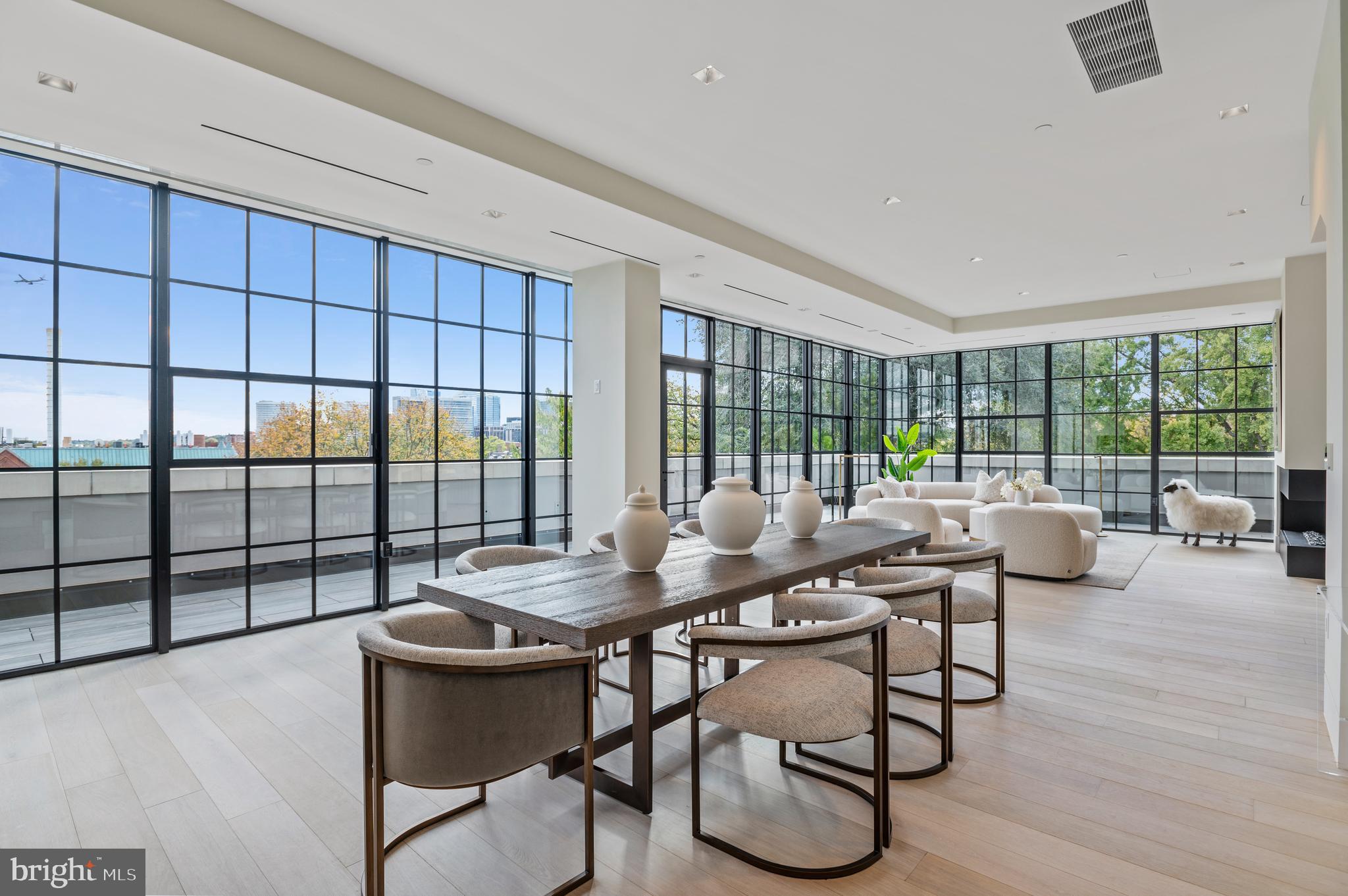 Call for additional information and floor plans. 
   
Luxury and Location.  Elegant and distinctive brand new construction in heart of Georgetown north of M Street (yes you read that right!) in boutique 5-unit building with a stunning open floor plan & exquisite finishes. Concierge on site 9:00AM to 5:00PM seven days a week.  Soaring 10'  ceilings throughout, oversized windows and doors offering both courtyard and city views, 7″ wide knotless White Italian Oak flooring; gas fireplace, wireless Lutron lighting and window coverings, Italian Snaidero designer kitchens with high end appliances, sleek high-gloss lacquer cabinetry and expansive countertops made of Caesarstone quartz present a sophisticated canvas for entertaining and gourmet cooking. 

The Elliott has one residence per floor, with an elevator that opens directly into the main living area or to the service corridor of each unit.  The penthouse residence has secure garage parking for three cars and a  private storage room on the garage level.  The large elevator can deliver you and your suitcases and groceries  straight from the garage to your apartment.   Generous-sized bedrooms bathed in light offer an oasis inside the city.   Exceptional window insulation and a commercial noise filtering design ensure a serene sanctuary.

Spacious baths are custom designed by Snaidero utilizing neutral tones and top-tier materials, with features that include primary bedroom steam showers, custom vanities and heated flooring. Baths are tiled floor to ceiling in Italian Marazzi Classentino marble and feature polished chrome Crosswater London and Grohe fixtures.  This penthouse has three parking spaces and a beautiful roof garden.

This is truly a one of a kind offering.