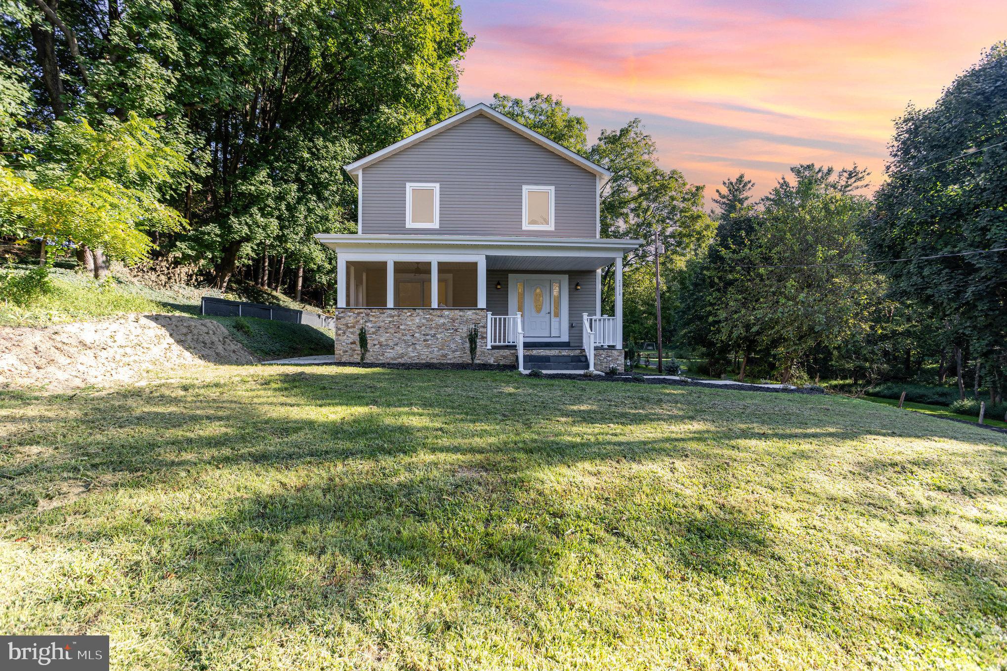 NEW CONSTRUCTION in Parkton! Welcome to 2430 Harris Mill Rd. This beautifully crafted home offers over 2,700 sq ft of finished living space on a spacious 1+ acre lot. Featuring 4 bedrooms and 4.5 baths, this home includes two primary suites (one on each floor), providing flexibility for a first-floor family room or den. Highlights include a well-appointed kitchen, elegant bathrooms, gleaming hardwood floors on the main and upper levels, and a finished basement with full bath. Outdoor amenities include a covered front porch, an additional screened-in porch with grill, a spacious patio and large yard. Driveway easement on property.