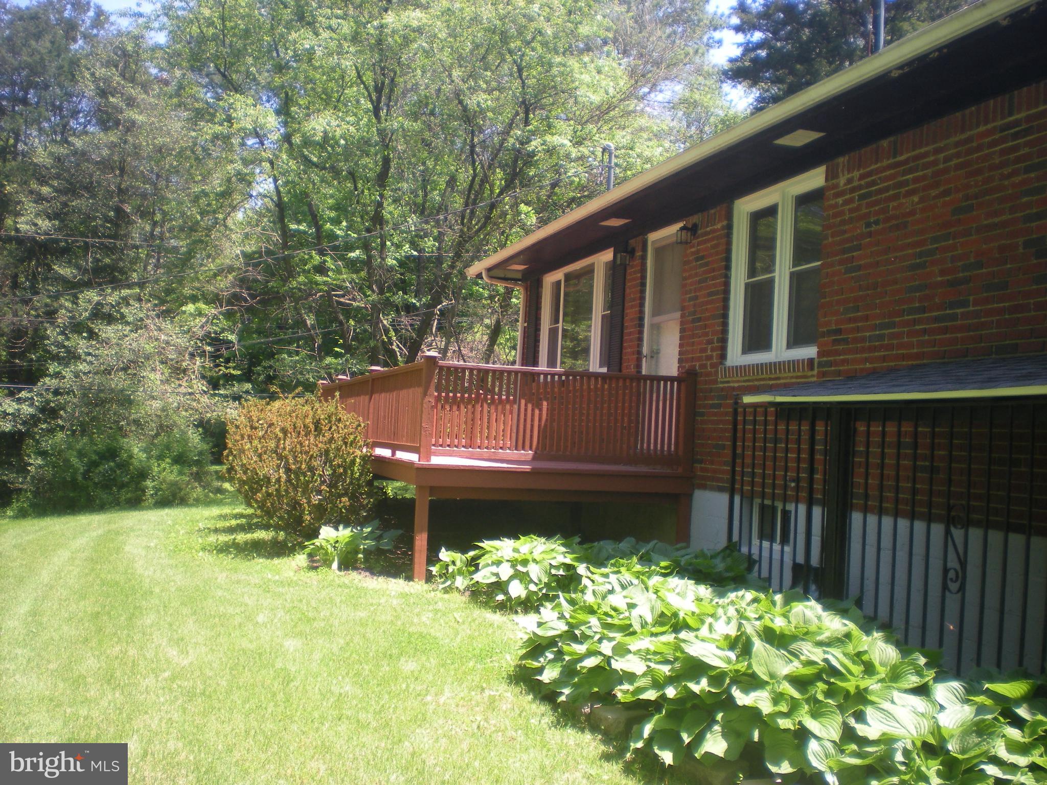 Cute as can be and only 5 minutes from #795.  This is a great location with lots of privacy.  All Brick Rancher with a nice deck in front and a patio in the back.  Plenty of parking and a nice yard.  Updated Kitchen Cabinets, counter top and floor.  Bathroom is updated with new vanity and flooring.  Freshly painted and ready to move in.    Please no pets and no smokers.