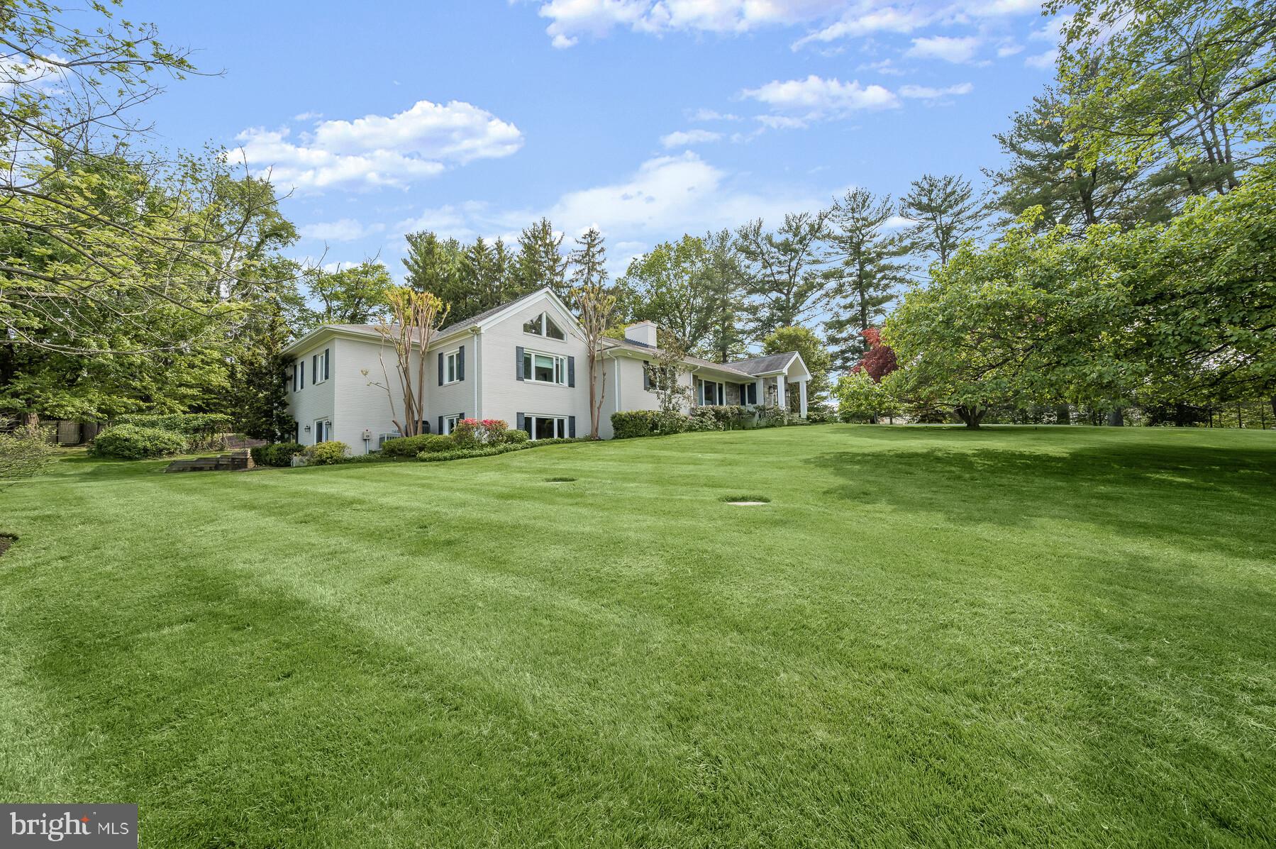 Welcome to 9029 Bronson Drive, a special property in a coveted and convenient location in Potomac. This 2-acre private property features a spacious main house with 6 bedrooms and 5.5 bathrooms with 7,053 square feet of living space on two levels as well as an additional 879 square foot guest house with a bedroom, full bathroom, kitchen and living room. 

The first floor of the primary residence features a grand foyer, formal living and dining rooms, and an open concept family room, kitchen, and breakfast nook with sliding glass doors leading to the outdoor patio with outdoor kitchen and pool. There is also a second family room or office off of the kitchen. The bedroom wing on the first floor includes 5 bedrooms and 3.5 bathrooms including a generous primary suite. Downstairs, the lower level boasts a large recreation room with a bar, theater room, bedroom suite with two full bathrooms, gym, laundry, and multiple storage rooms.

The outdoor living space is equally impressive, with two acres of land, a regulation-sized tennis court with pickle ball court, a beautiful pool, detached two car garage with EV charger and driveway with ample parking. This property is perfect for entertaining and relaxing with family and friends with a wonderful location just before Potomac Village with easy access to Bethesda, DC and all major commuter routes