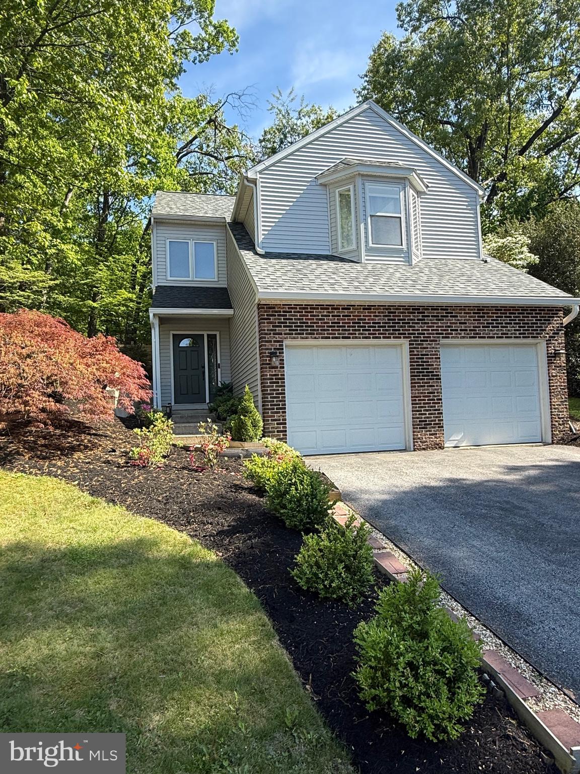 New price adjustment on this Well-Maintained single-family home locate on a cul-de-sac. This Beauty boasts 3 levels of contemporary
 living. entering the main entry, travel up a few steps and you will be in awe with the open, Vaulted ceilings in the large living room. Off to the right is a decent size dining room. Enter into the bright, renovated kitchen, featuring beautiful granite counters, and a very bright breakfast area overlooking a professionally landscaped patio, deck, yard. Truly a peaceful retreat! The next level is the owner's suite featuring a fully renovated bath and walk in closet. The top level you will find the last 2 spacious bedrooms and another full bath. What is to love about this house, newer paint throughout, updated light fixtures, renovated primary bath, soaring vaulted ceilings, updated granite counters, tile back splash and floors, breakfast bar that seats 4, Hard wood and engineered flooring, main level laundry, and so much more. The 2 car garage features plenty of storage. Outside the professionally landscaped yard gives you peace, tranquility, and privacy! Truly move in ready home.