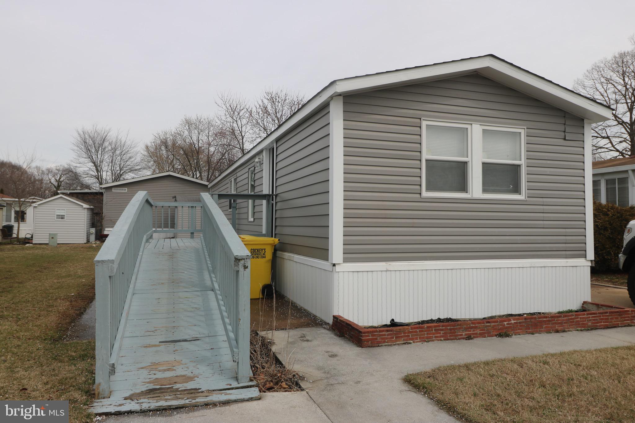 Charming and well-updated 2-bedroom, 1-bathroom mobile home conveniently located on a main road with easy access to nearby amenities. Recent updates include newly installed recessed lighting, fresh interior paint, and updated siding, giving the home a bright and refreshed feel.

The property features a wheelchair-accessible ramp, making it more accessible and convenient for a variety of needs. Enjoy outdoor living with a deck perfect for relaxing or entertaining. The home also offers a driveway with space for two vehicles, along with additional street parking available.

A great opportunity for comfortable and convenient living—schedule your showing today!