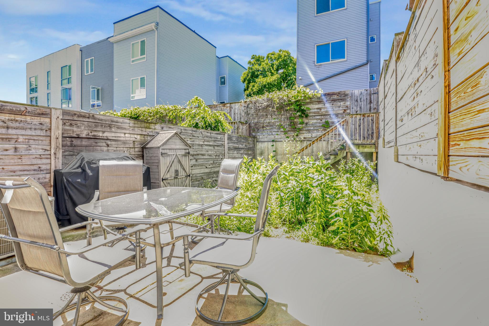 A refined, high-impact listing description for 1952 N 6th St is provided below, designed to balance sophisticated appeal with the practical details Philadelphia buyers prioritize.

1952 N 6th St | Offered at $399,000

Experience the quintessential Philadelphia lifestyle in this impeccably maintained, modern residence that masterfully balances open-concept design with refined finishes. Situated in a rapidly evolving corridor, this home offers a sophisticated urban retreat for the discerning buyer.

**Architectural Flow & Design**
Upon entry, the expansive main level reveals a seamless transition from the inviting living area to a dedicated dining space, all anchored by rich, dark-toned hardwood flooring. The intentional layout is flooded with natural light from large windows, further enhanced by a crisp, neutral palette and strategic recessed lighting that emphasizes the home's impressive scale.

**Culinary Excellence**
The chef’s kitchen serves as a centerpiece of both style and utility, featuring:

  * **Custom Cabinetry:** Sleek gray shaker-style cabinets providing abundant storage.
  * **Premium Surfaces:** Elegant white quartz countertops extending into a peninsula with breakfast bar seating.
  * **Professional Grade:** Full suite of stainless steel appliances, including a five-burner gas range, built-in microwave, and integrated dishwasher.

**Private Sanctuary & Spa-Inspired Baths**
The upper levels house tranquil bedrooms characterized by generous proportions and versatile layouts. The primary suite is a true getaway, offering a massive walk-in closet with custom shelving to satisfy any storage requirement. The bathrooms are equally impressive, showcasing designer vanity units, modern lighting, and premium tile work in the walk-in glass shower and deep soaking tub configurations.

**Exceptional Urban Amenities**

  * **Outdoor Living:** Rare for the city, the private, fully-fenced rear patio is perfect for hosting weekend gatherings or enjoying a quiet morning coffee.
  * **Modern Conveniences:** A dedicated laundry room features high-efficiency, large-capacity Maytag front-loading machines for ultimate convenience.
  * **Versatile Spaces:** Bright secondary bedrooms provide the ideal canvas for a home office or guest suite.

This residence represents a standout opportunity to own a turnkey home in a vibrant community. At $399,000, 1952 N 6th St offers a compelling combination of luxury, location, and value.