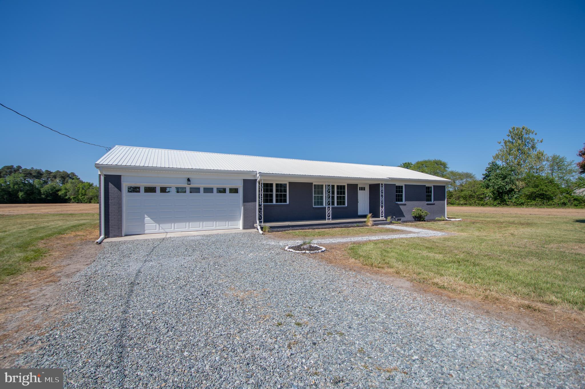 Welcome to this beautifully renovated 4-bedroom, 2-bathroom home in Laurel, DE, offering modern updates and plenty of space both inside and out. Situated on a .92-acre lot, this home features major improvements completed in 2024, including a new roof, new windows, new HVAC system, and a new PEAT septic system for added peace of mind. Step inside to the spacious living room filled with natural light from the large front window. Continuing into the kitchen, you’ll find granite countertops, stainless steel appliances, ample counter space, and a dining area with access to the back deck—perfect for entertaining or relaxing outdoors. The first bathroom features a tile walk-in shower, while the second bathroom offers a tile tub/shower combo. Additional highlights include a 2-car garage and a convenient location close to town amenities while still offering room to spread out.